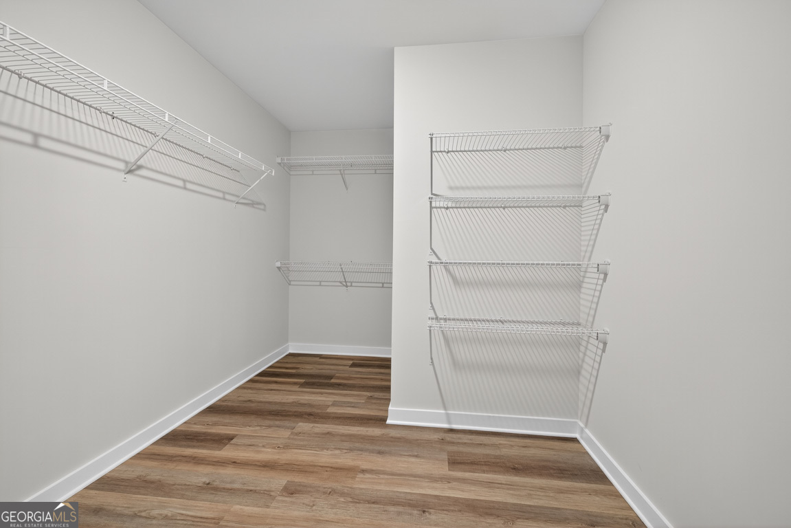 77 Sugar Maple Way, Unit 44 Colbert, GA 30628 - Photo 26 of 30 a view of an empty walk in closet