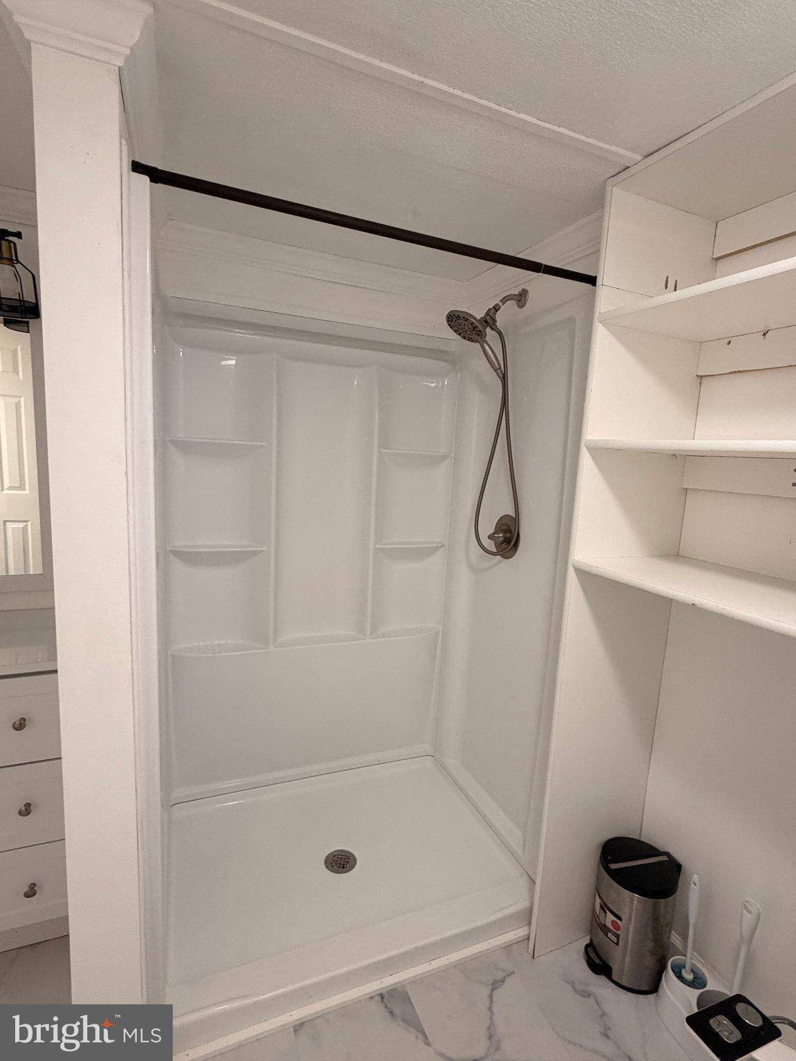 24 Carpenter Street, Unit 24 Dover, DE 19901 - Photo 7 of 27 Sleek, modern shower space awaits you.