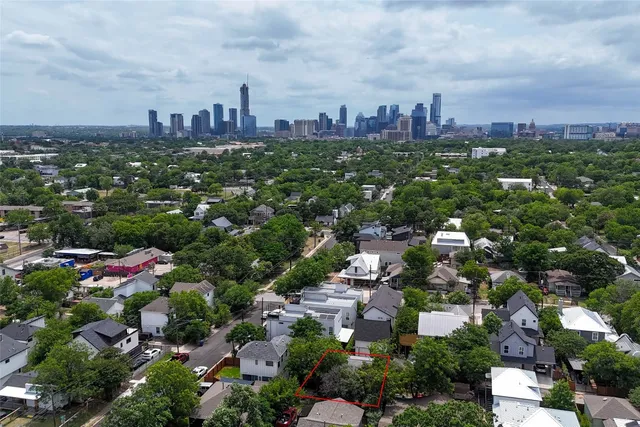 an aerial view of a city with lots of residential buildings
