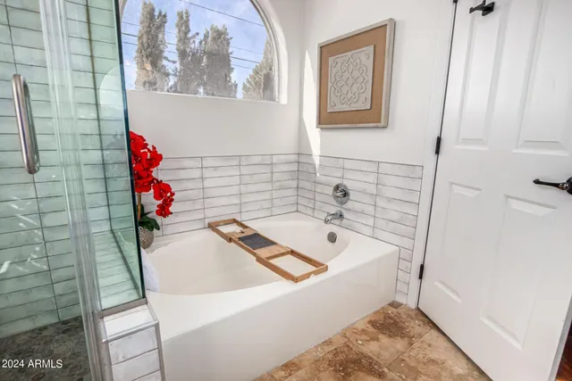 a bathroom with a sink and bathtub