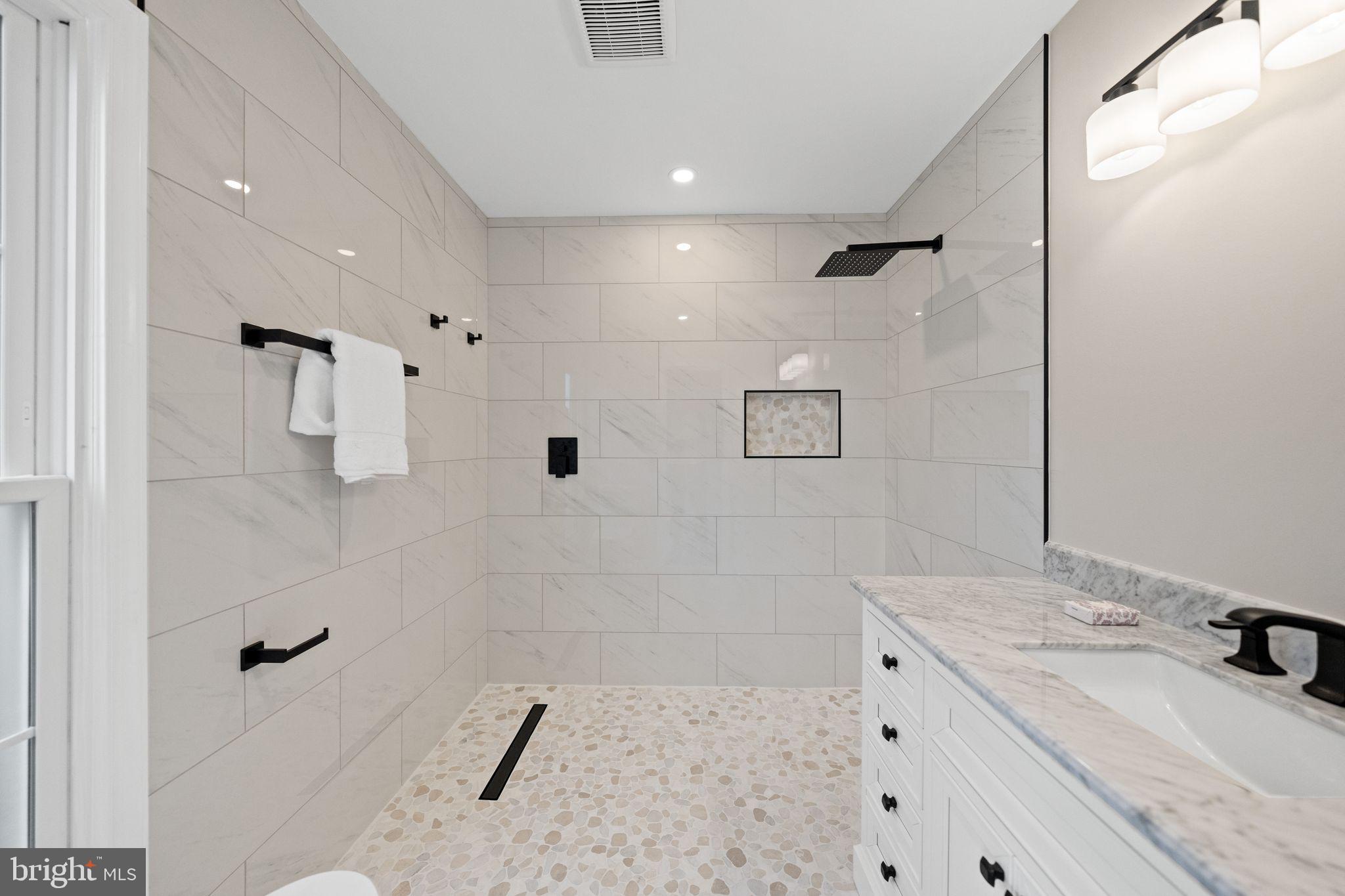10028 Dellcastle Road Gaithersburg, MD 20886 - Photo 24 of 57 Primary bath with walk in shower
