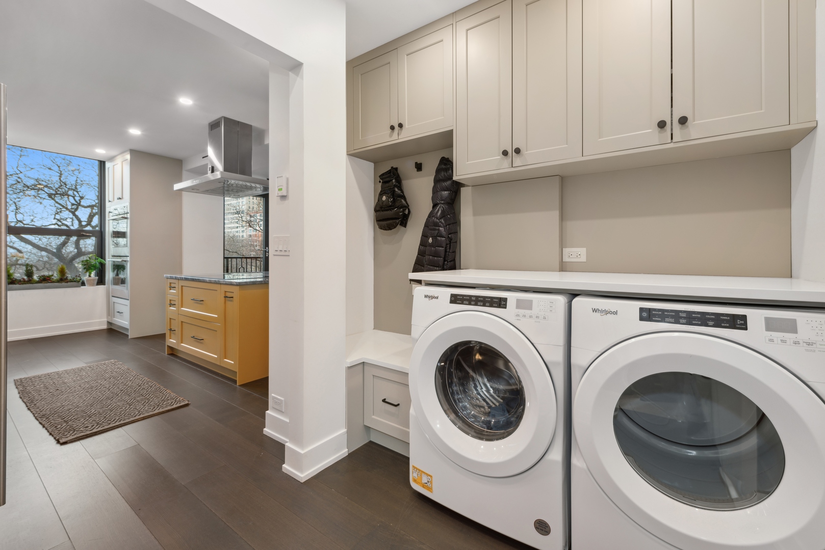 1040 North Lake Shore Drive, Unit 4A Chicago, IL 60611 - Photo 16 of 43 a view of a hallway with washer and dryer