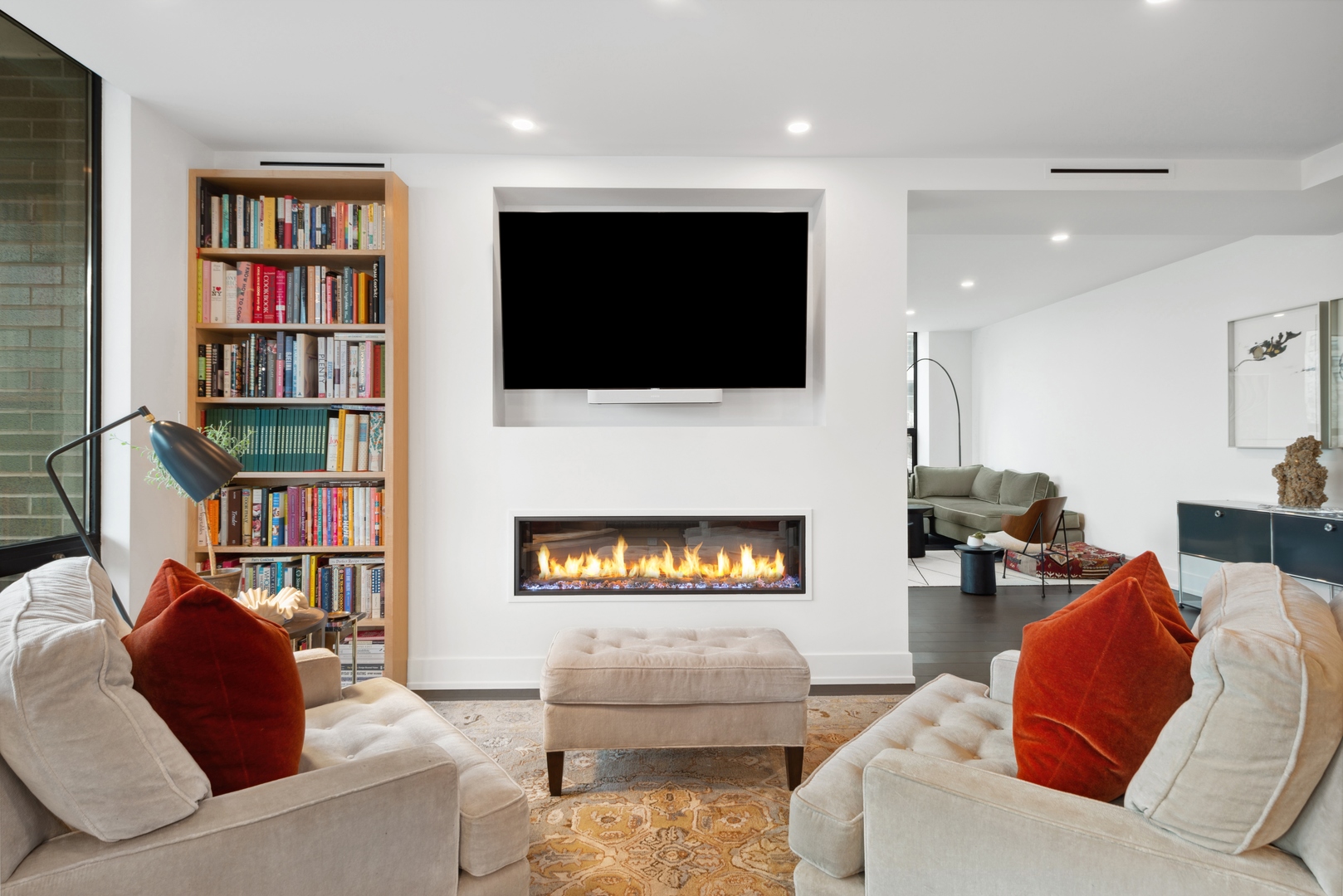 1040 North Lake Shore Drive, Unit 4A Chicago, IL 60611 - Photo 18 of 43 a living room with furniture and a flat screen tv