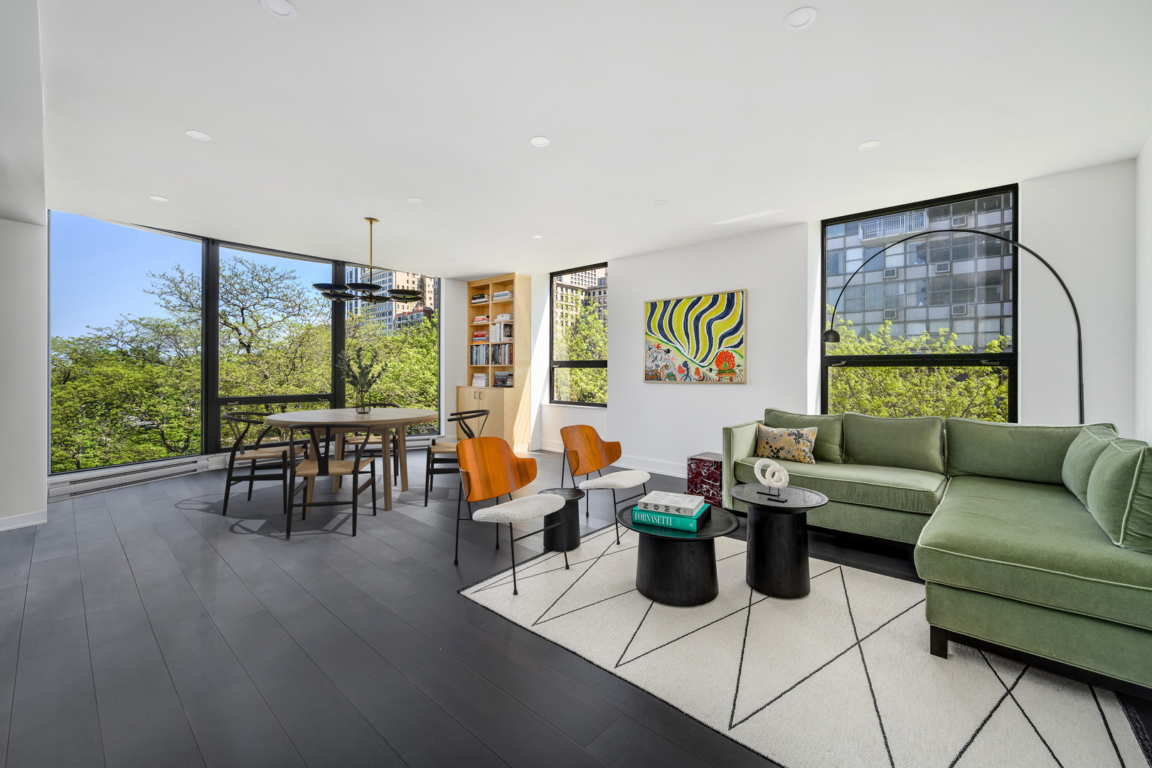 1040 North Lake Shore Drive, Unit 4A Chicago, IL 60611 - Photo 20 of 43 a living room with furniture and large windows
