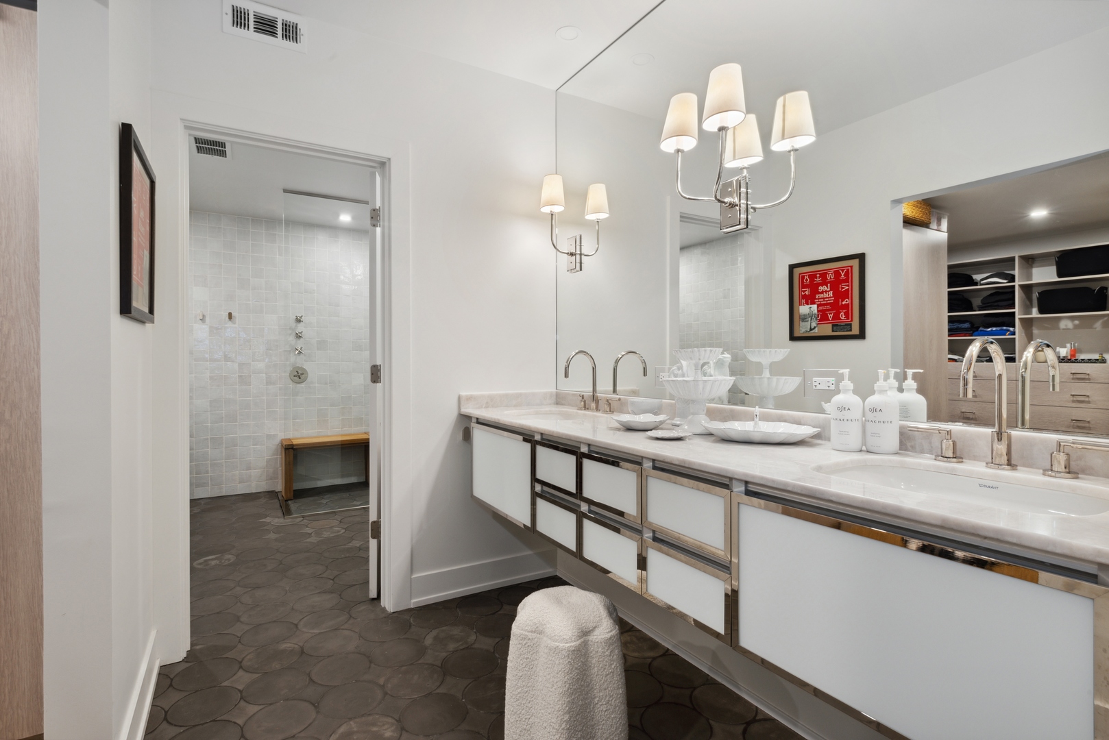 1040 North Lake Shore Drive, Unit 4A Chicago, IL 60611 - Photo 28 of 43 a bathroom with a sink a vanity and a mirror