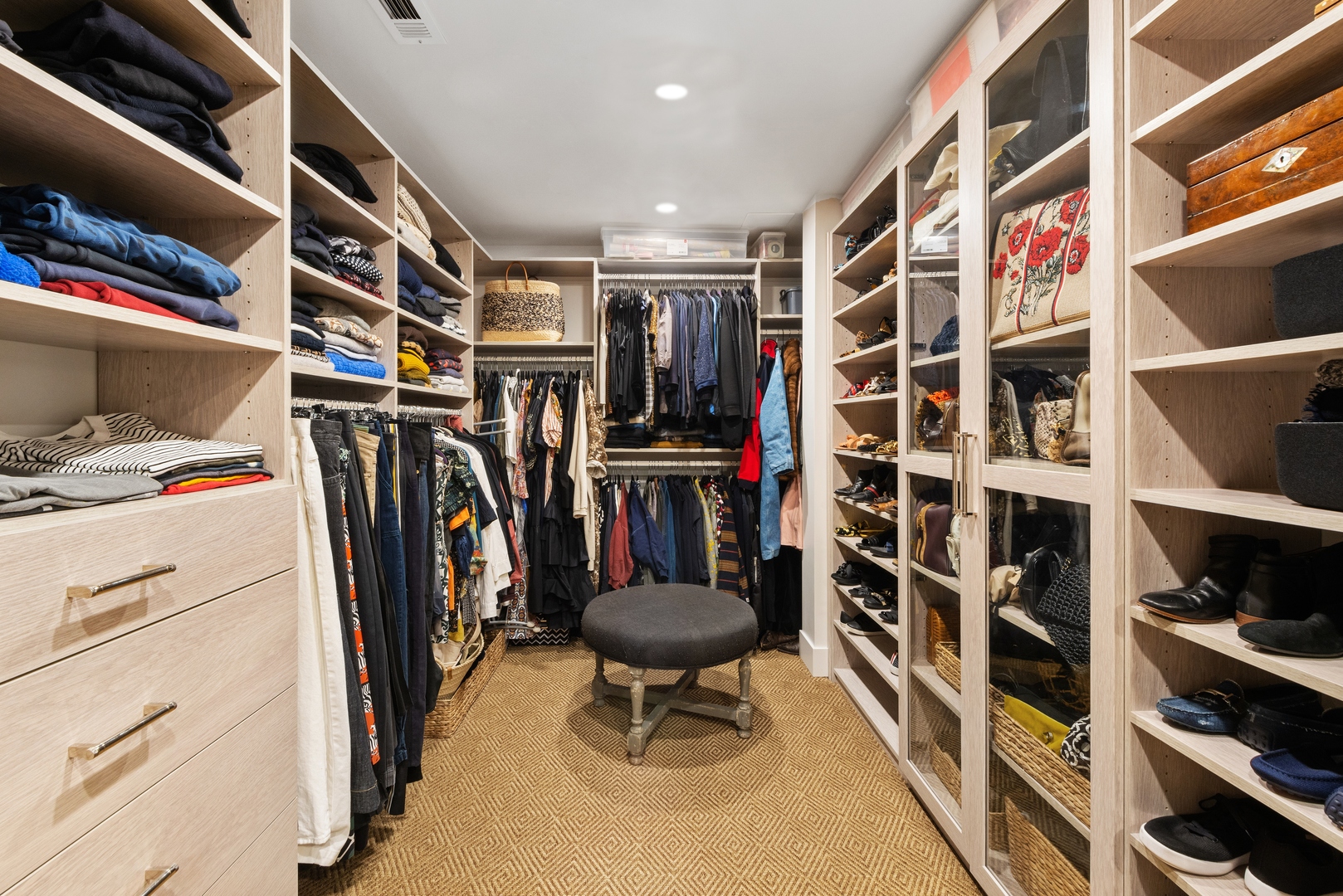 1040 North Lake Shore Drive, Unit 4A Chicago, IL 60611 - Photo 31 of 43 a view of walk in closet with clothes and shoes