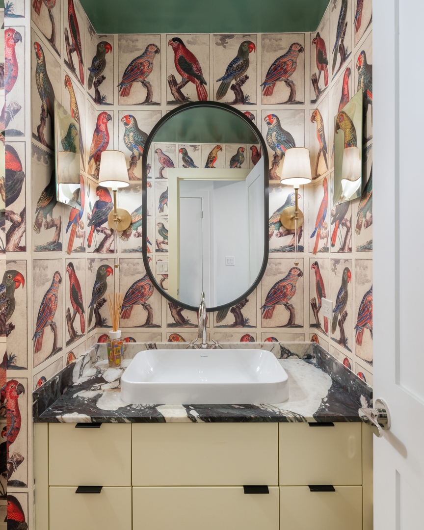 1040 North Lake Shore Drive, Unit 4A Chicago, IL 60611 - Photo 32 of 43 a bathroom with a granite countertop sink and a mirror