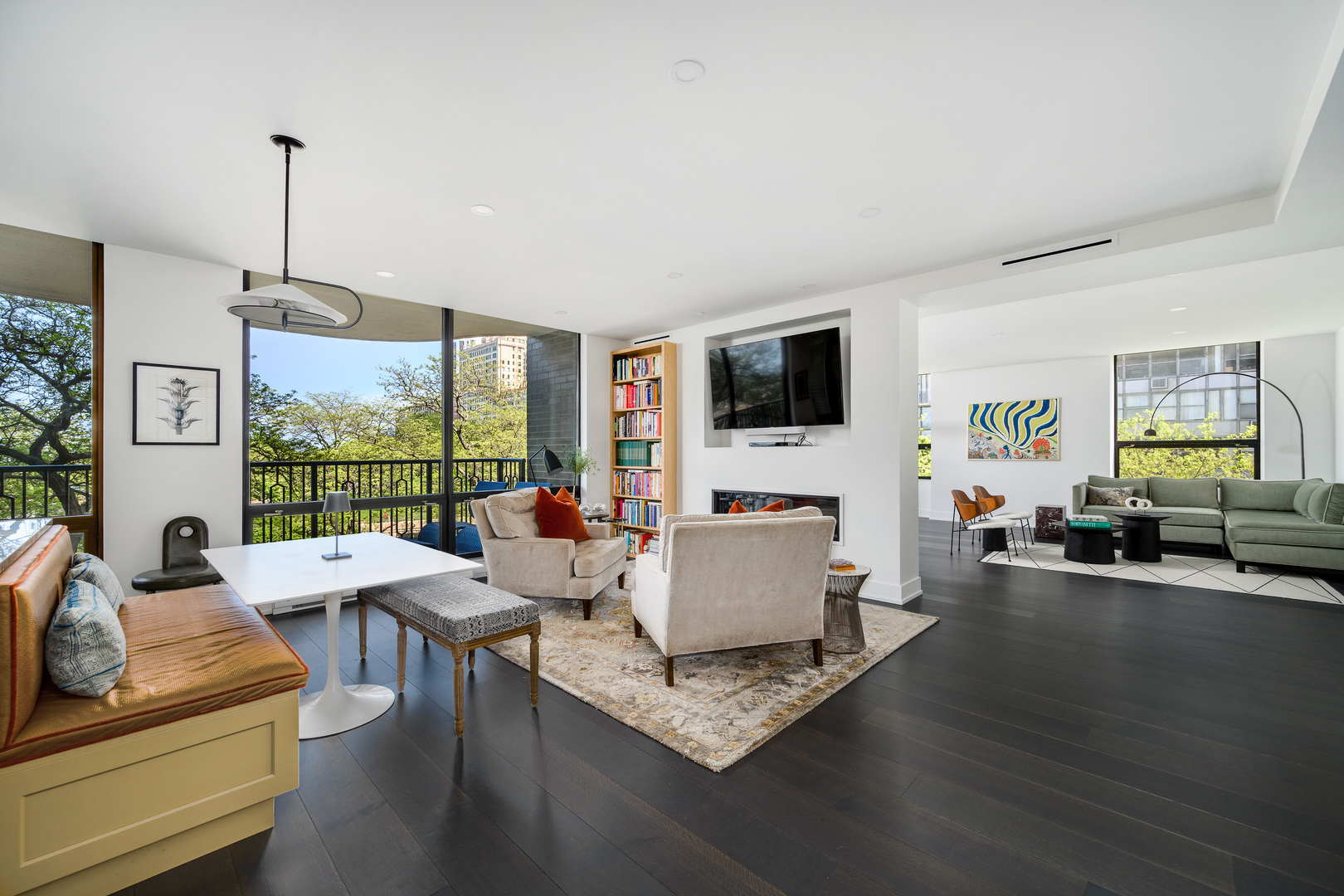 1040 North Lake Shore Drive, Unit 4A Chicago, IL 60611 - Photo 6 of 43 a living room with furniture large window and flat screen tv