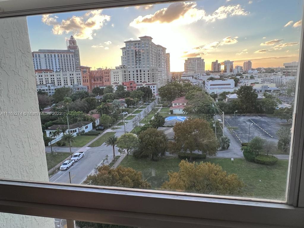 2351 Douglas Road, Unit 908 Miami, FL 33145 - Photo 8 of 17 a view of a city from a window