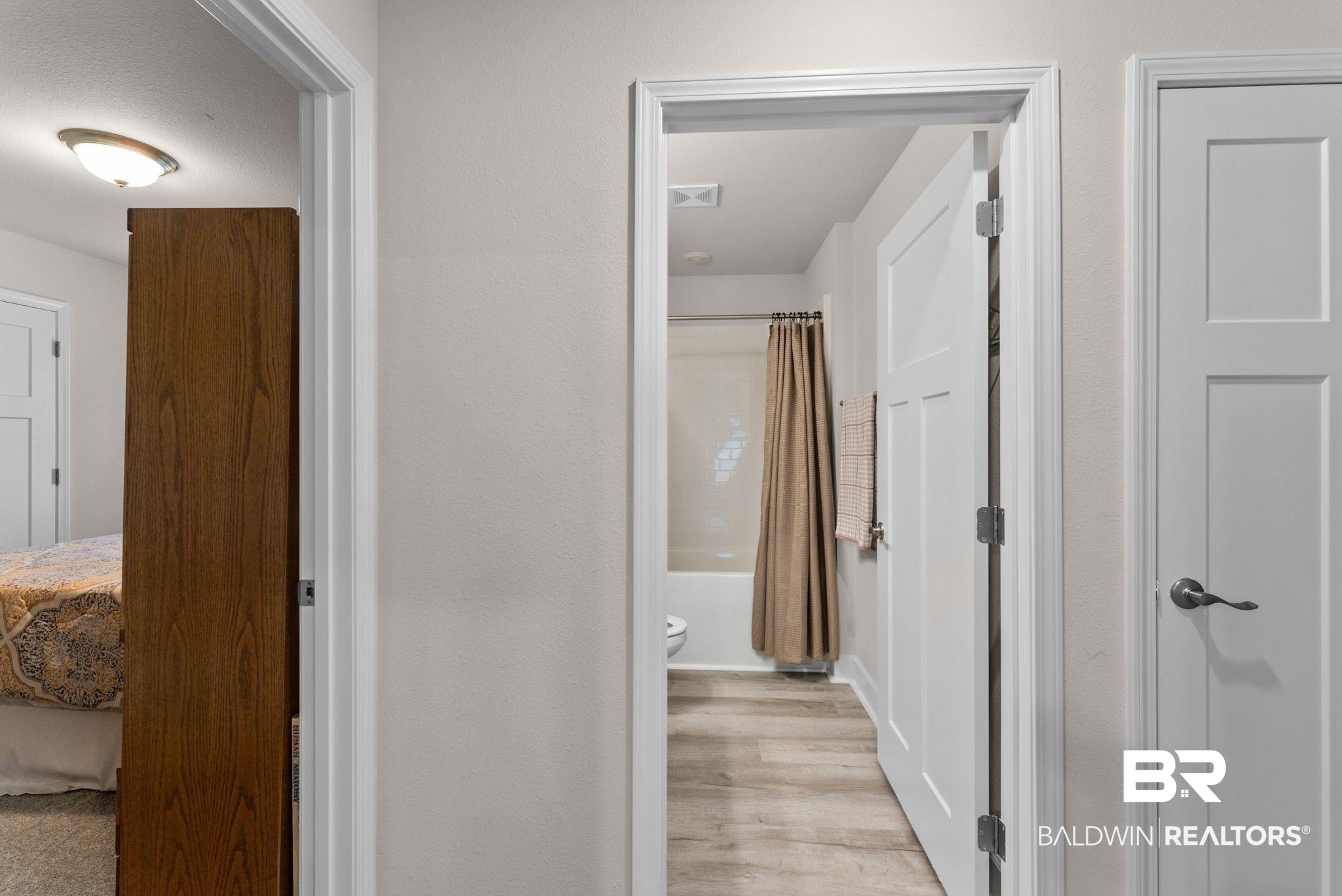 692 Mayflower Drive Foley, AL 36535 - Photo 30 of 40 Corridor featuring light wood-type flooring