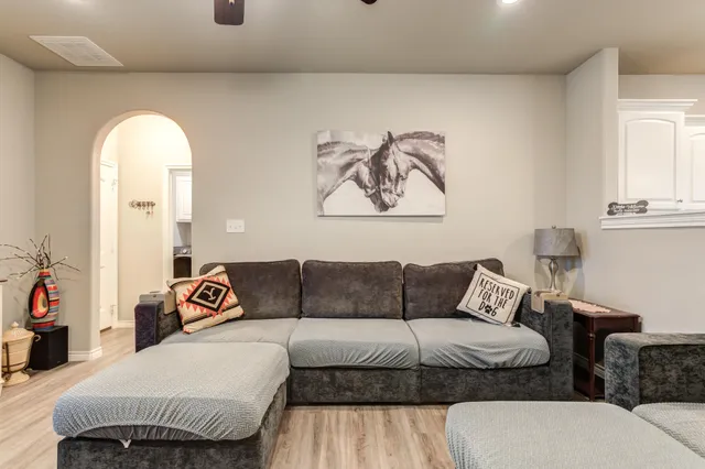 a living room with furniture and a couch