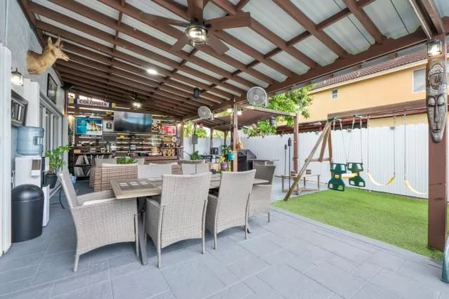 a bedroom with a bed and a table