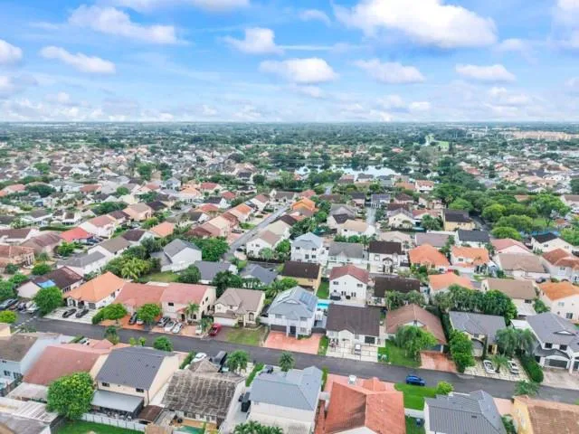 an aerial view of a city with lots of residential buildings