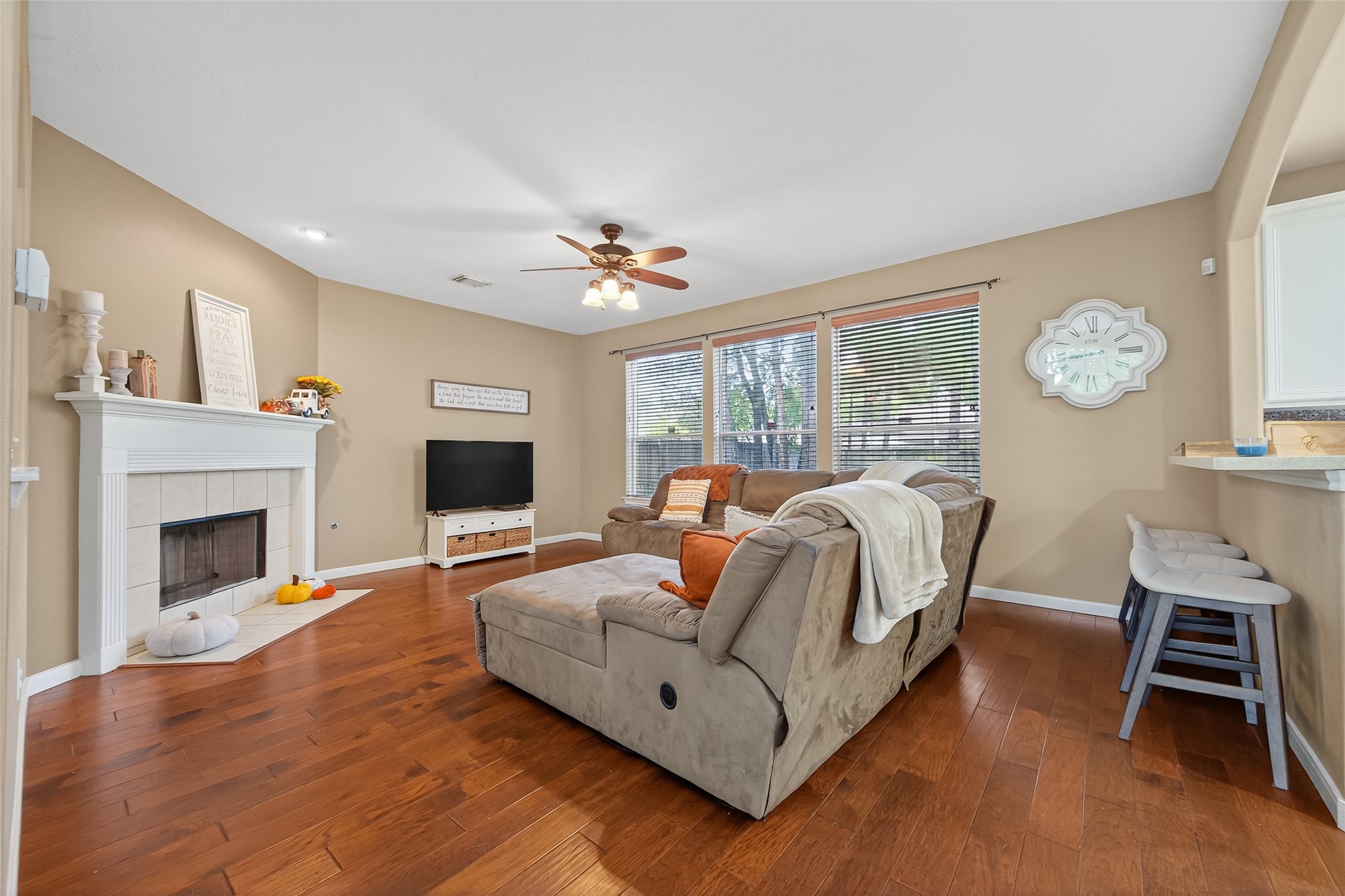 59 Genesee Ridge Drive Conroe, TX 77385 - Photo 11 of 44 a living room with furniture and a fireplace