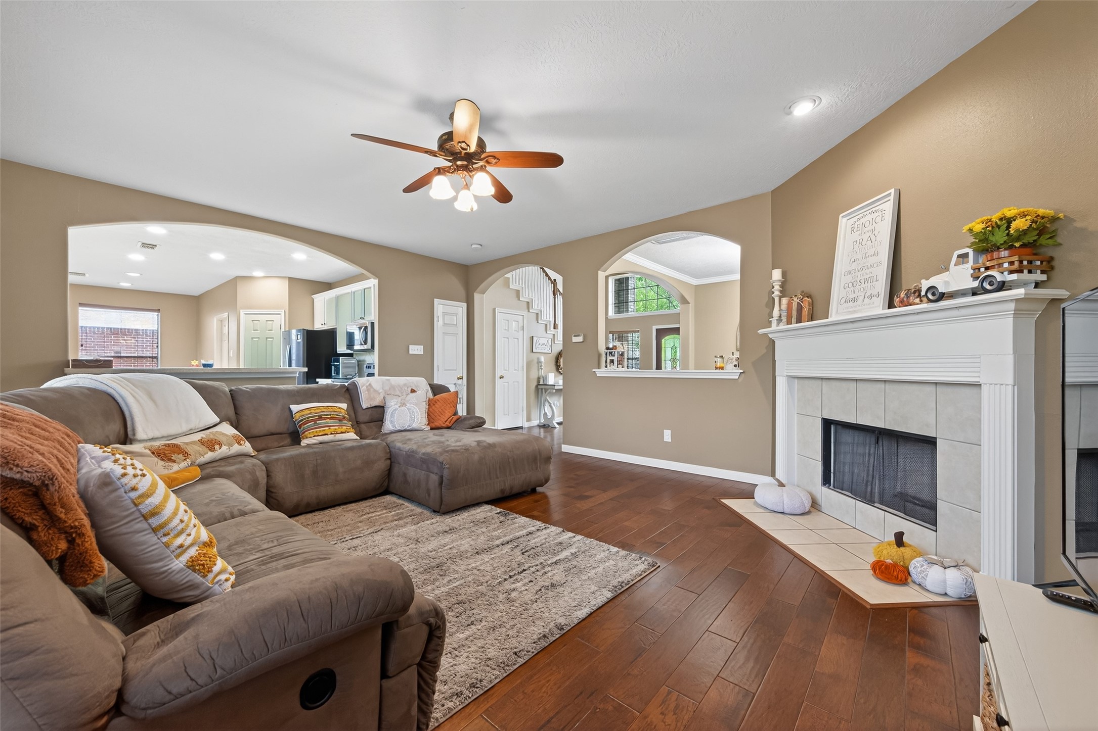 59 Genesee Ridge Drive Conroe, TX 77385 - Photo 14 of 44 a living room with furniture and a fireplace