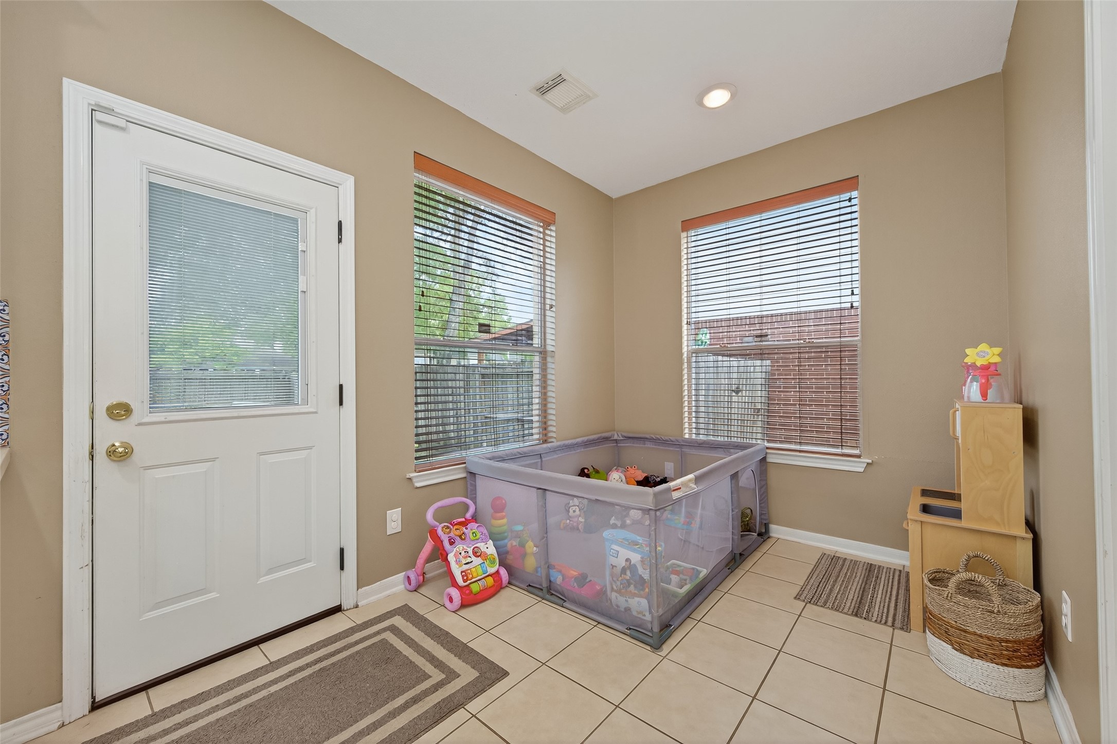 59 Genesee Ridge Drive Conroe, TX 77385 - Photo 20 of 44 a bed room with a bed and a window