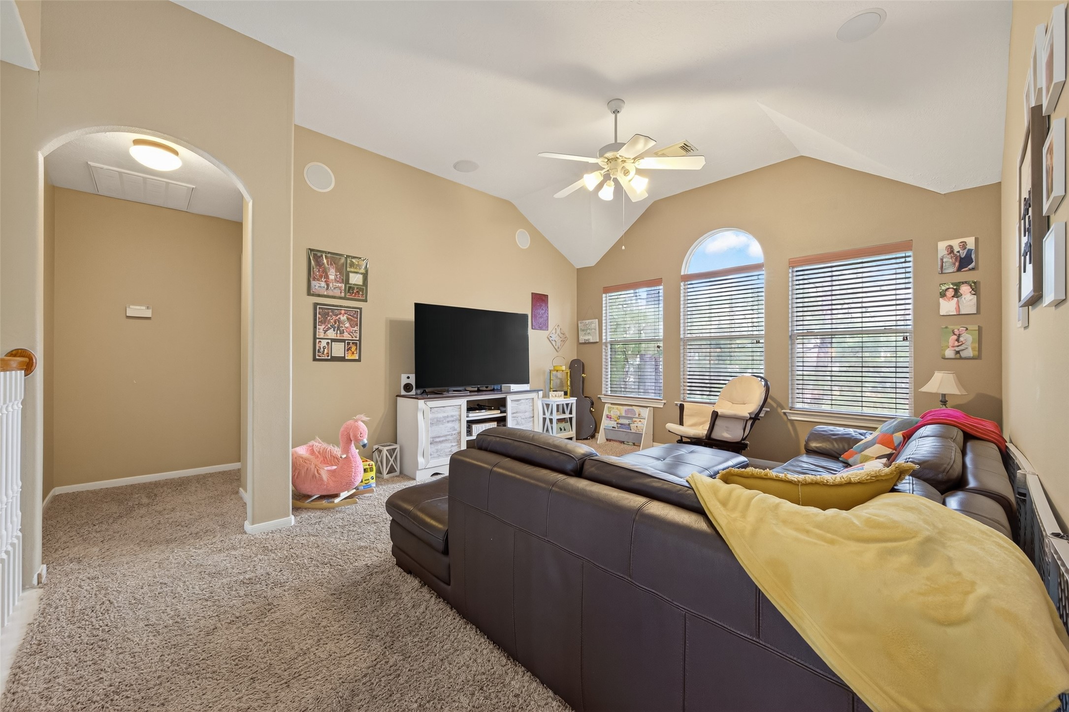 59 Genesee Ridge Drive Conroe, TX 77385 - Photo 28 of 44 a bedroom with a bed and a flat screen tv