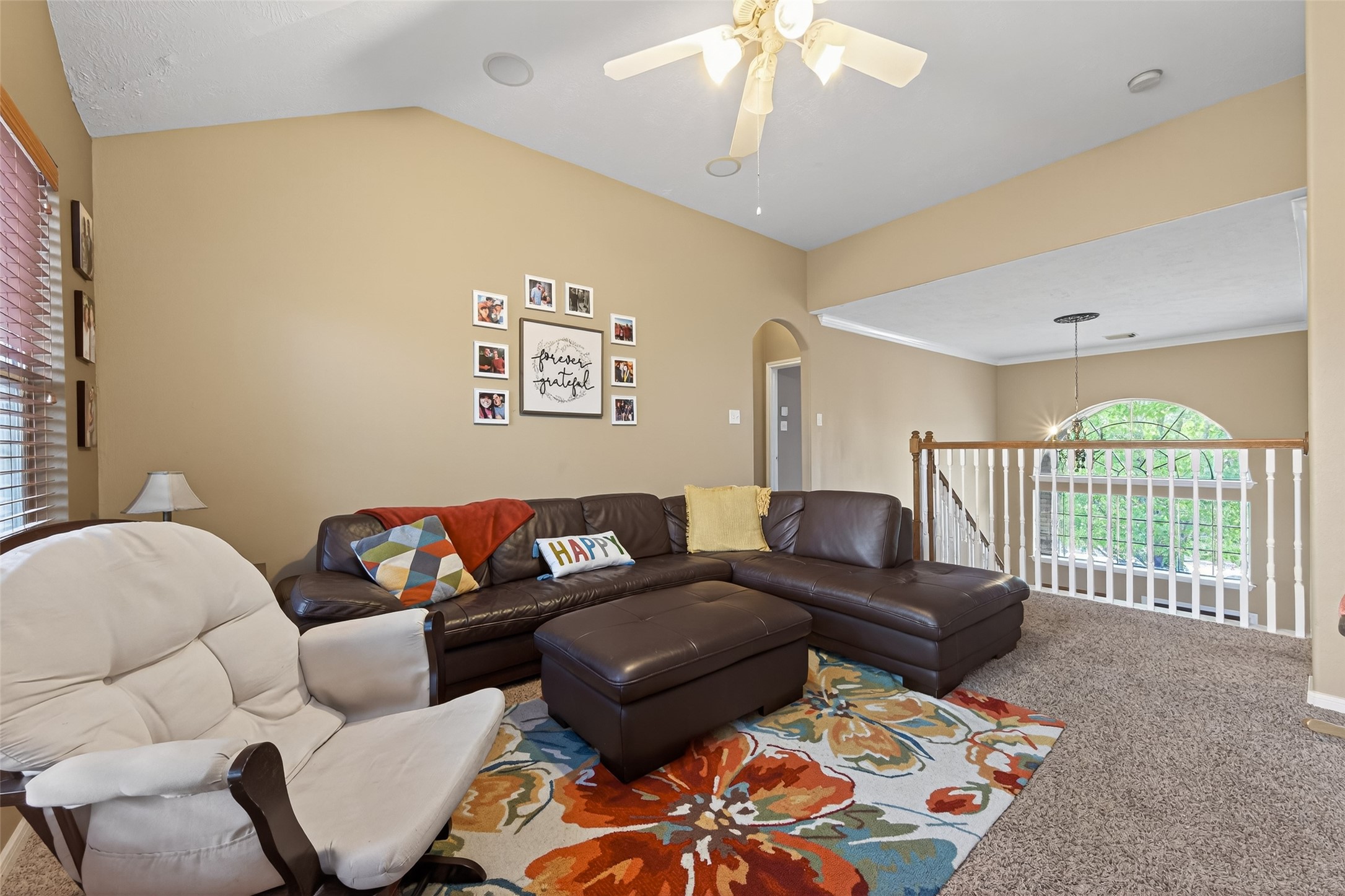 59 Genesee Ridge Drive Conroe, TX 77385 - Photo 30 of 44 a living room with furniture and a wooden floor