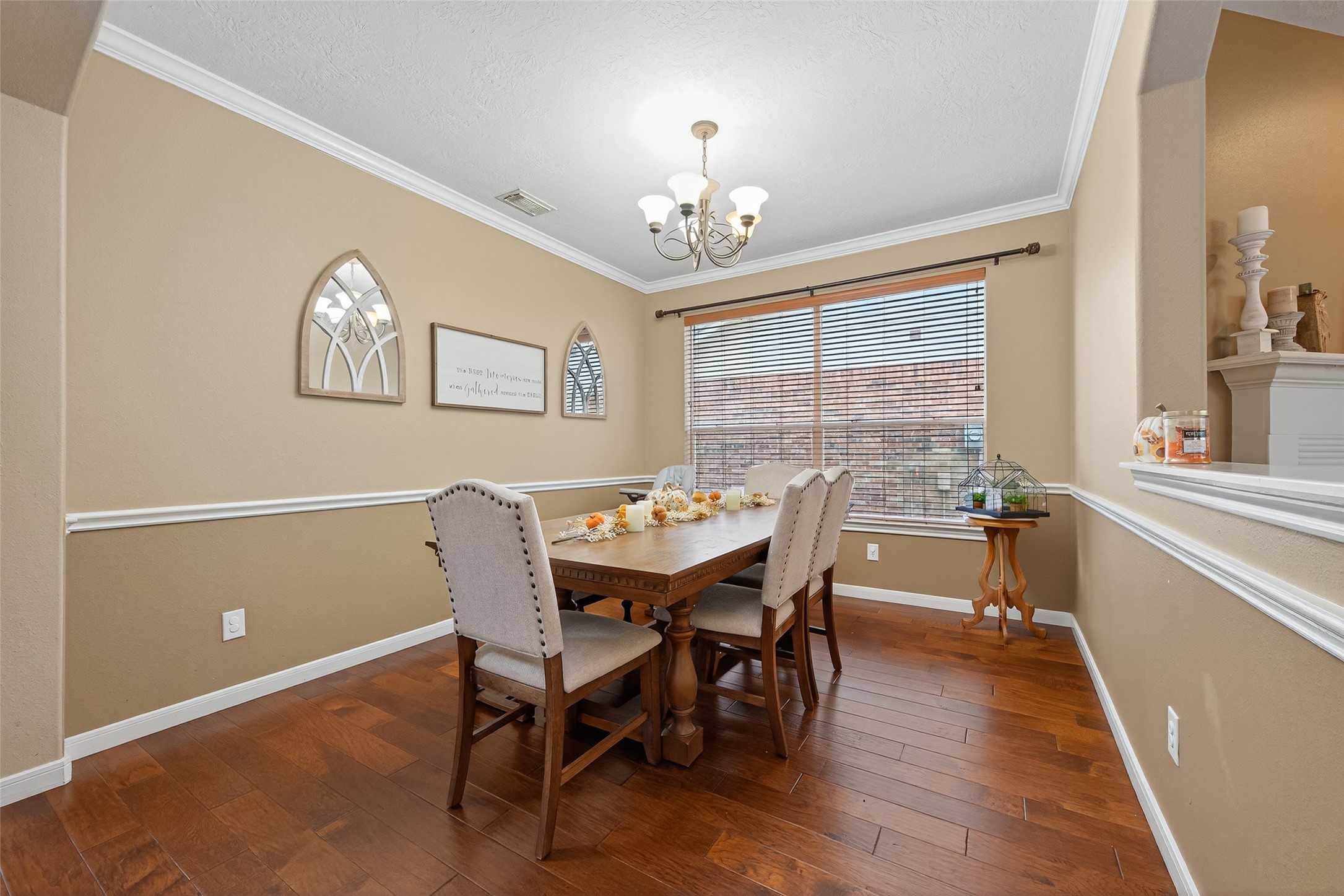 59 Genesee Ridge Drive Conroe, TX 77385 - Photo 9 of 44 a view of a dining room with furniture window and wooden floor