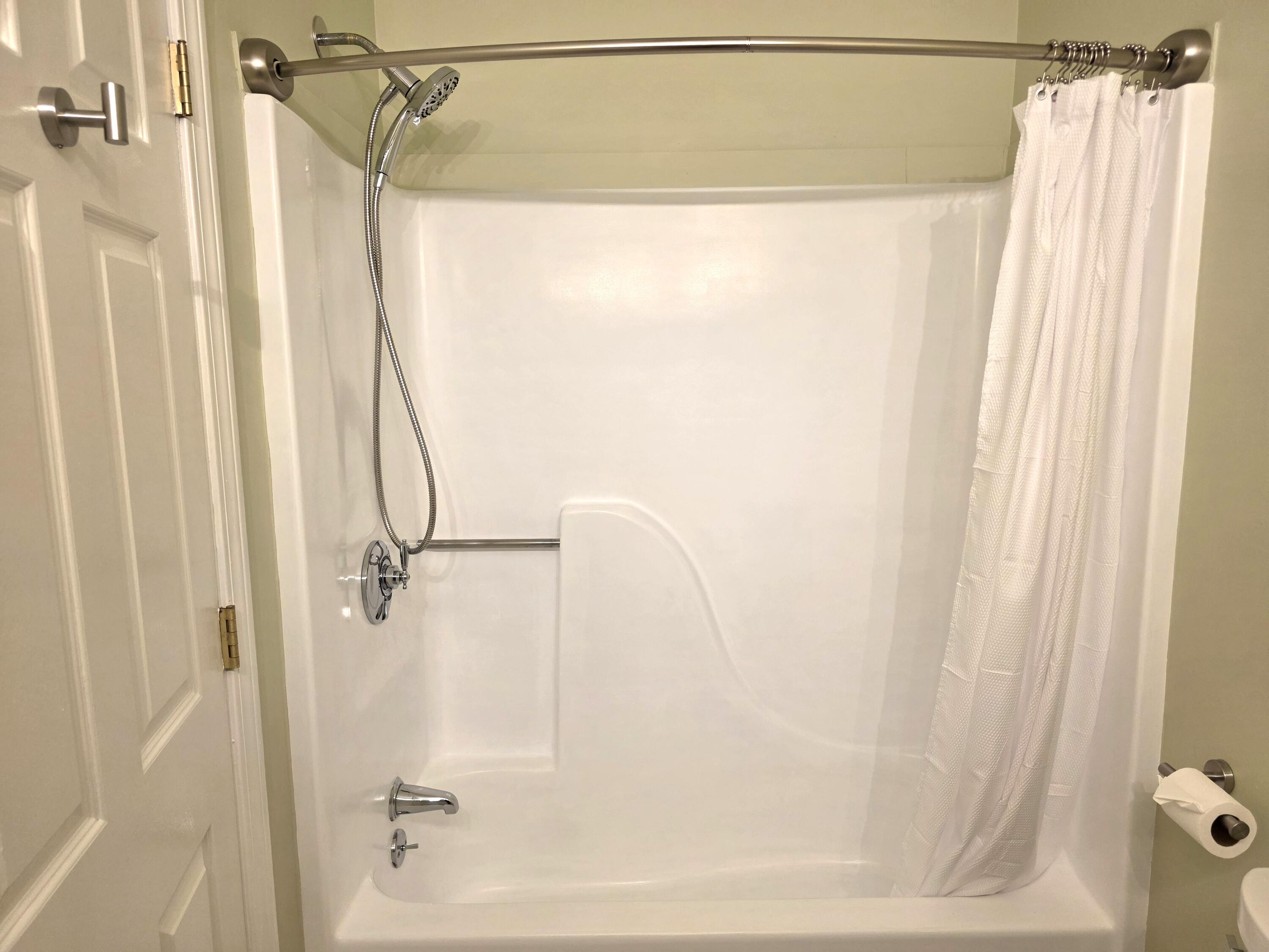 720 Pitchers Way, Unit F52 Hyannis, MA 02601 - Photo 21 of 25 a bathroom with a shower and a glass door