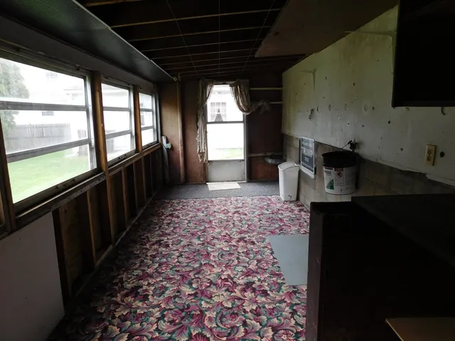 an empty room with windows