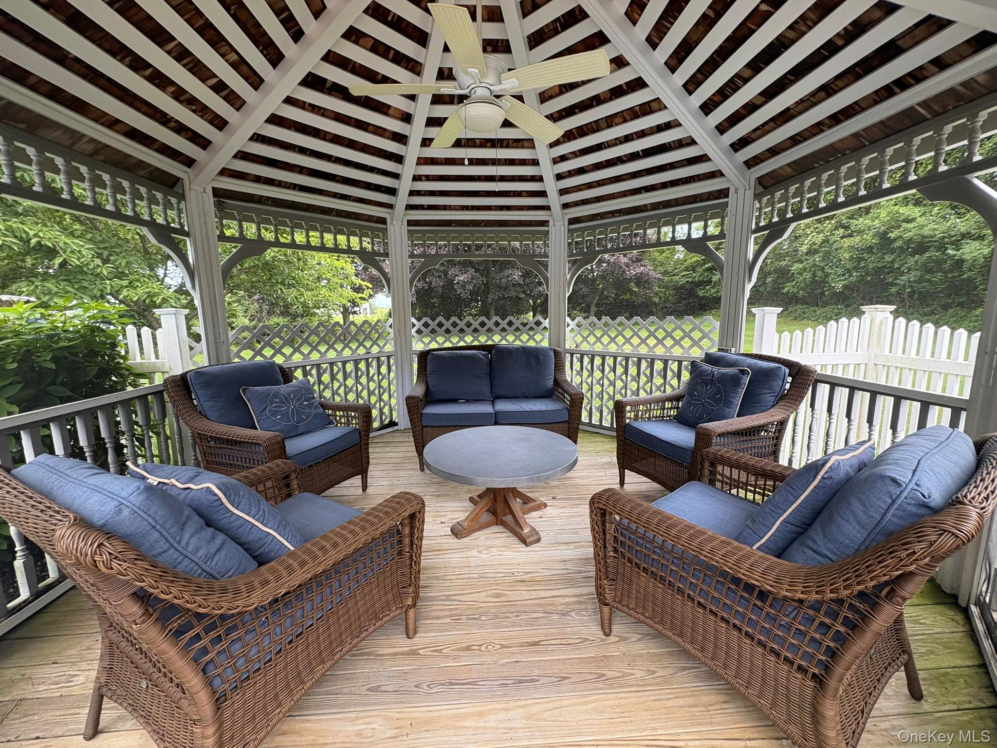 365 Chablis Path Southold, NY 11971 - Photo 20 of 30 a building outdoor space with patio furniture