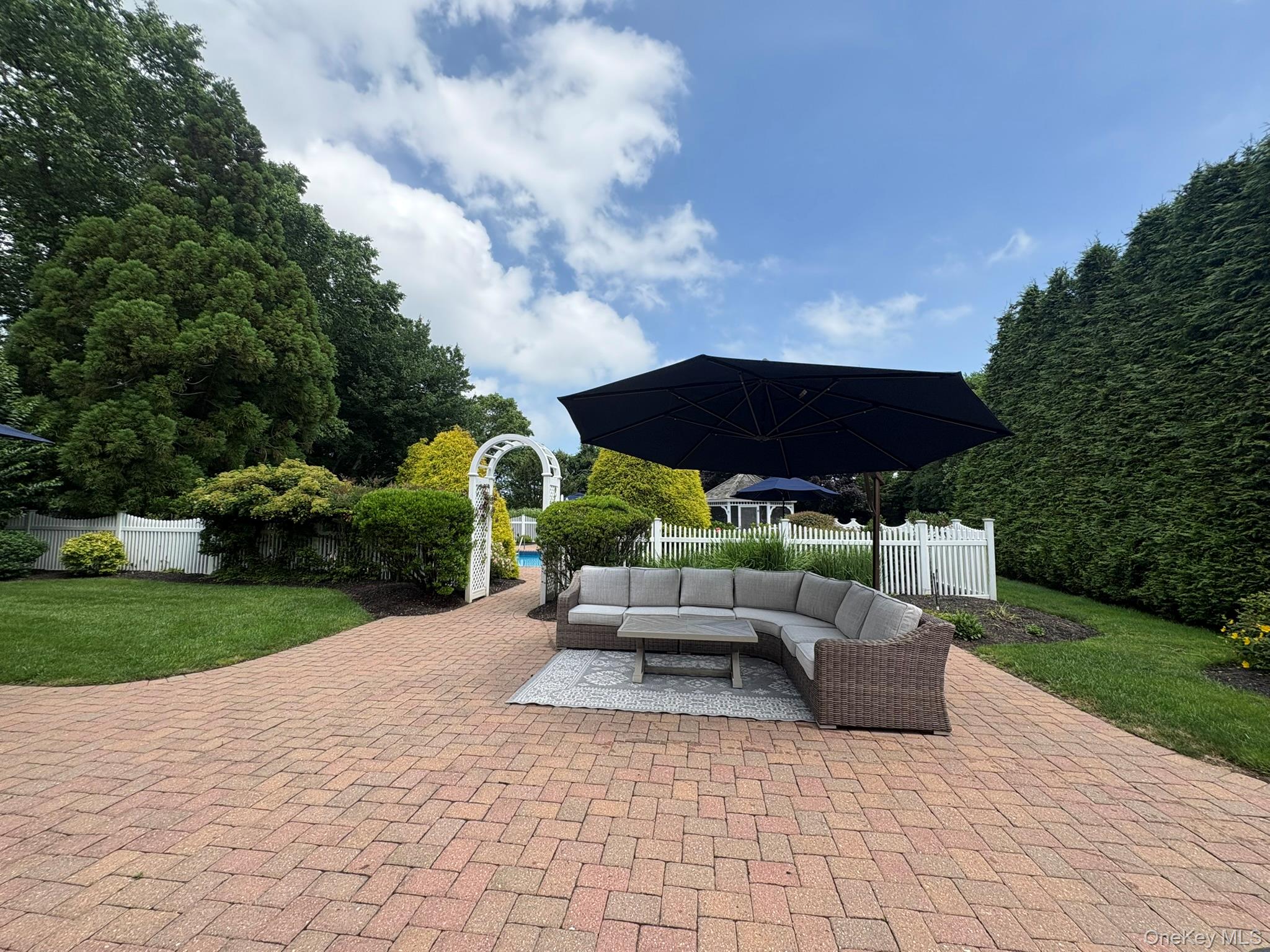 365 Chablis Path Southold, NY 11971 - Photo 25 of 30 a view of backyard with seating space