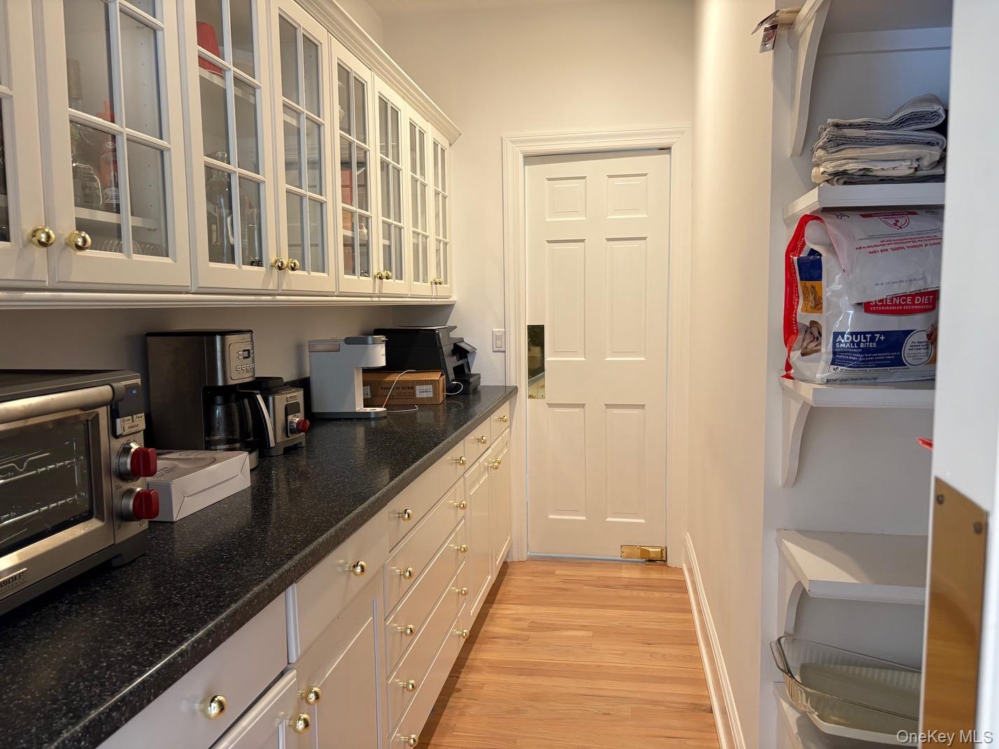 365 Chablis Path Southold, NY 11971 - Photo 8 of 30 a view of a kitchen from the hallway