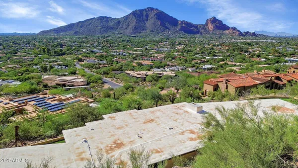 a view of a house with a mountain