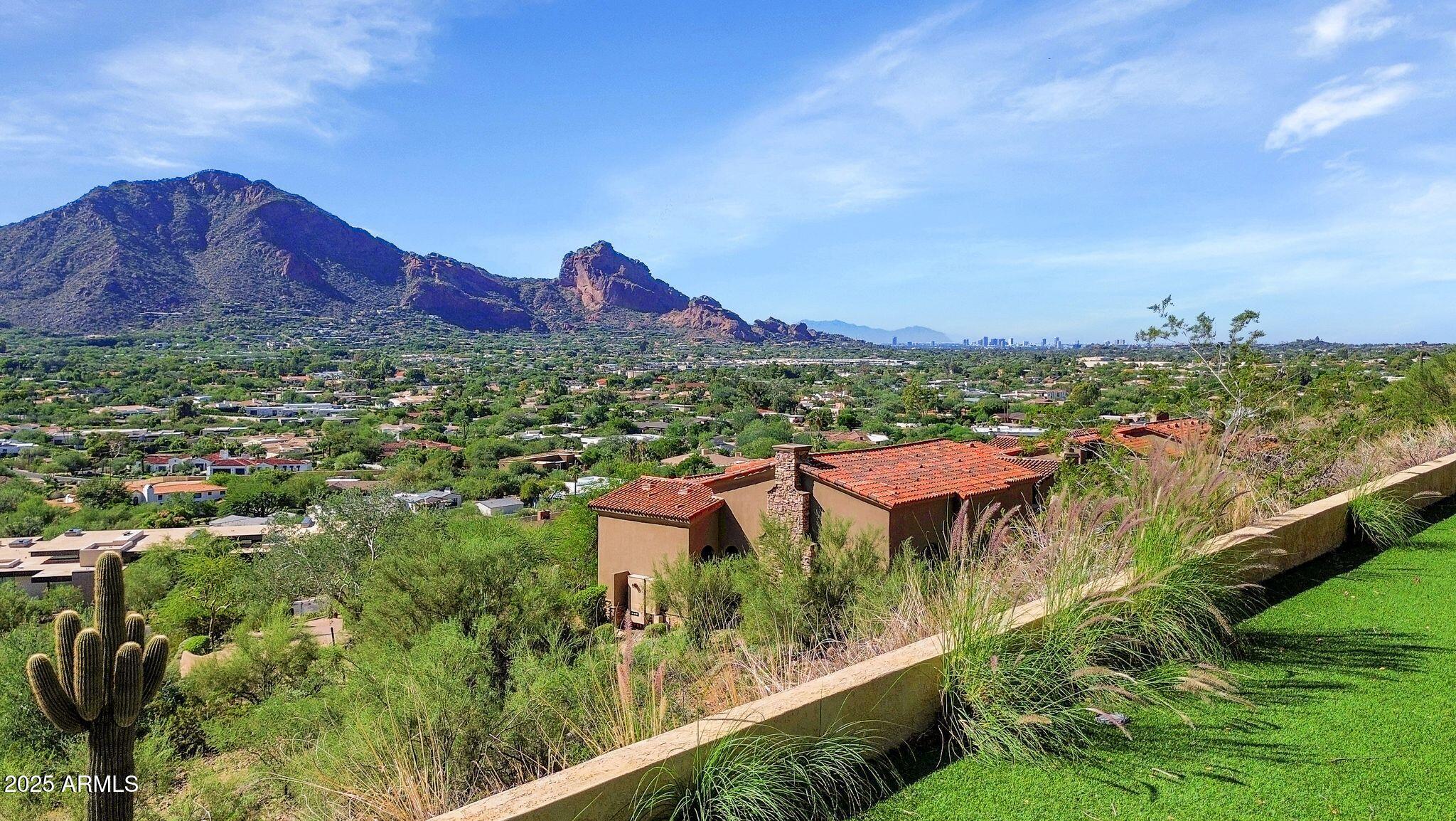 7040 North Invergordon Road Paradise Valley, AZ 85253 - Photo 8 of 11 a view of a city with a garden