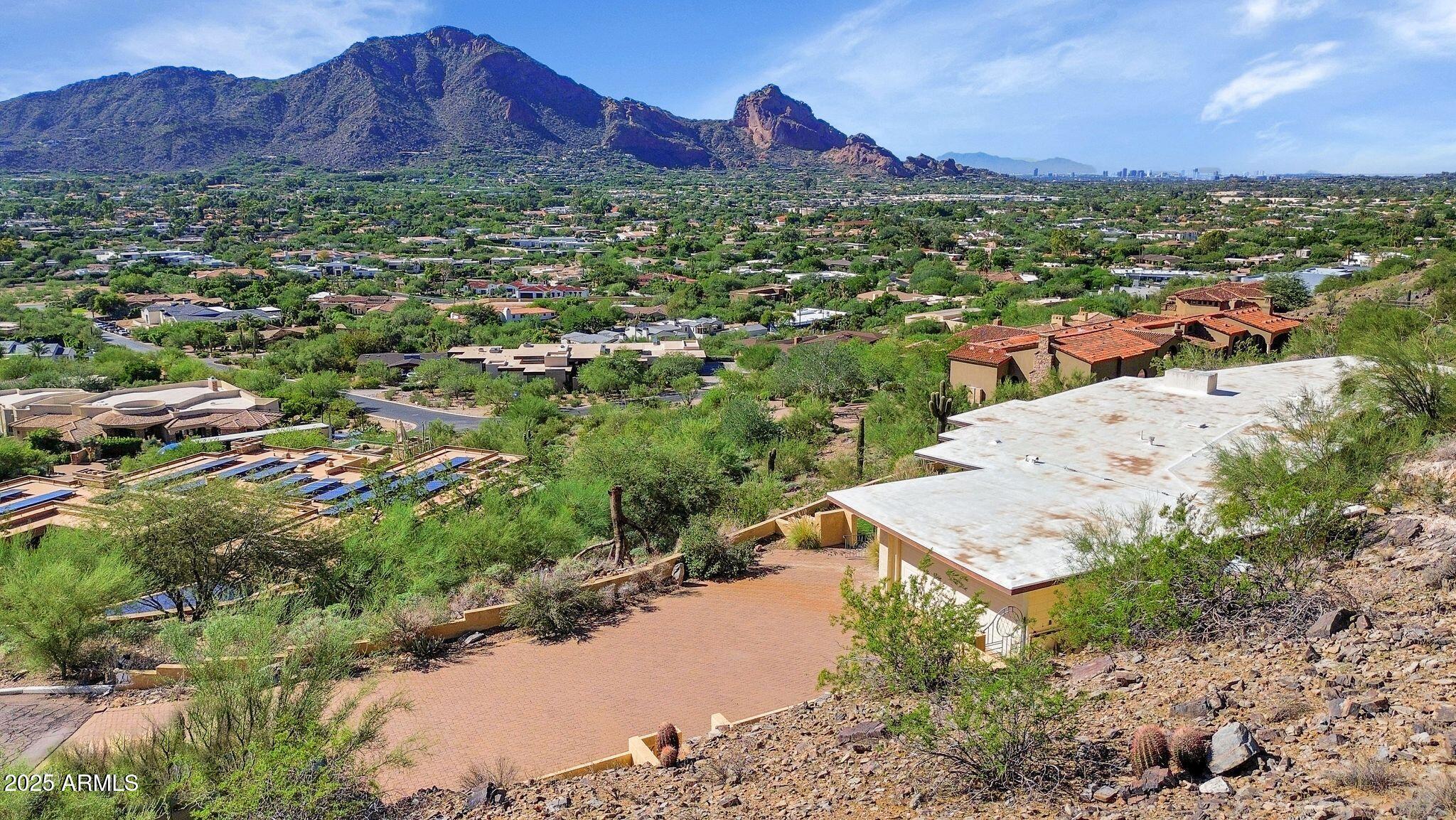 7040 North Invergordon Road Paradise Valley, AZ 85253 - Photo 10 of 11 a view of a city with mountain
