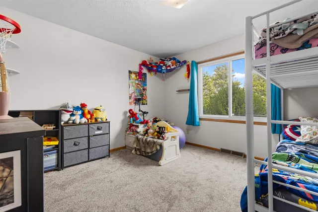 a kids room with toys and toys