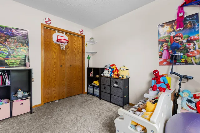 a storage room with furniture and toys