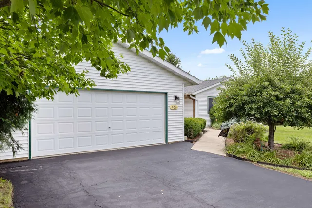 a view of a house with a garage