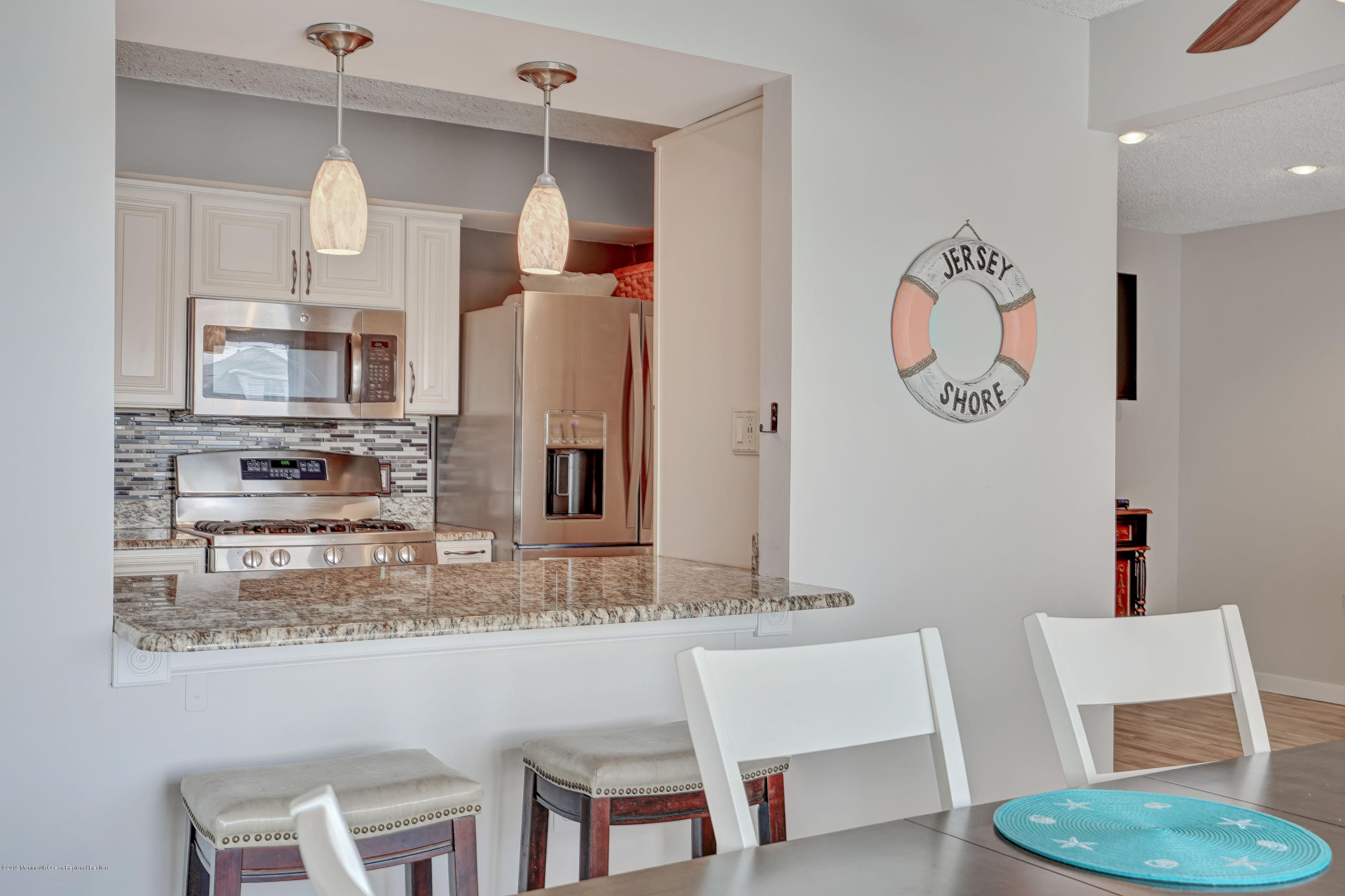 42 Hamilton Avenue, Unit B11 Seaside Heights, NJ 08751 - Photo 11 of 24 a bathroom with a sink and a mirror