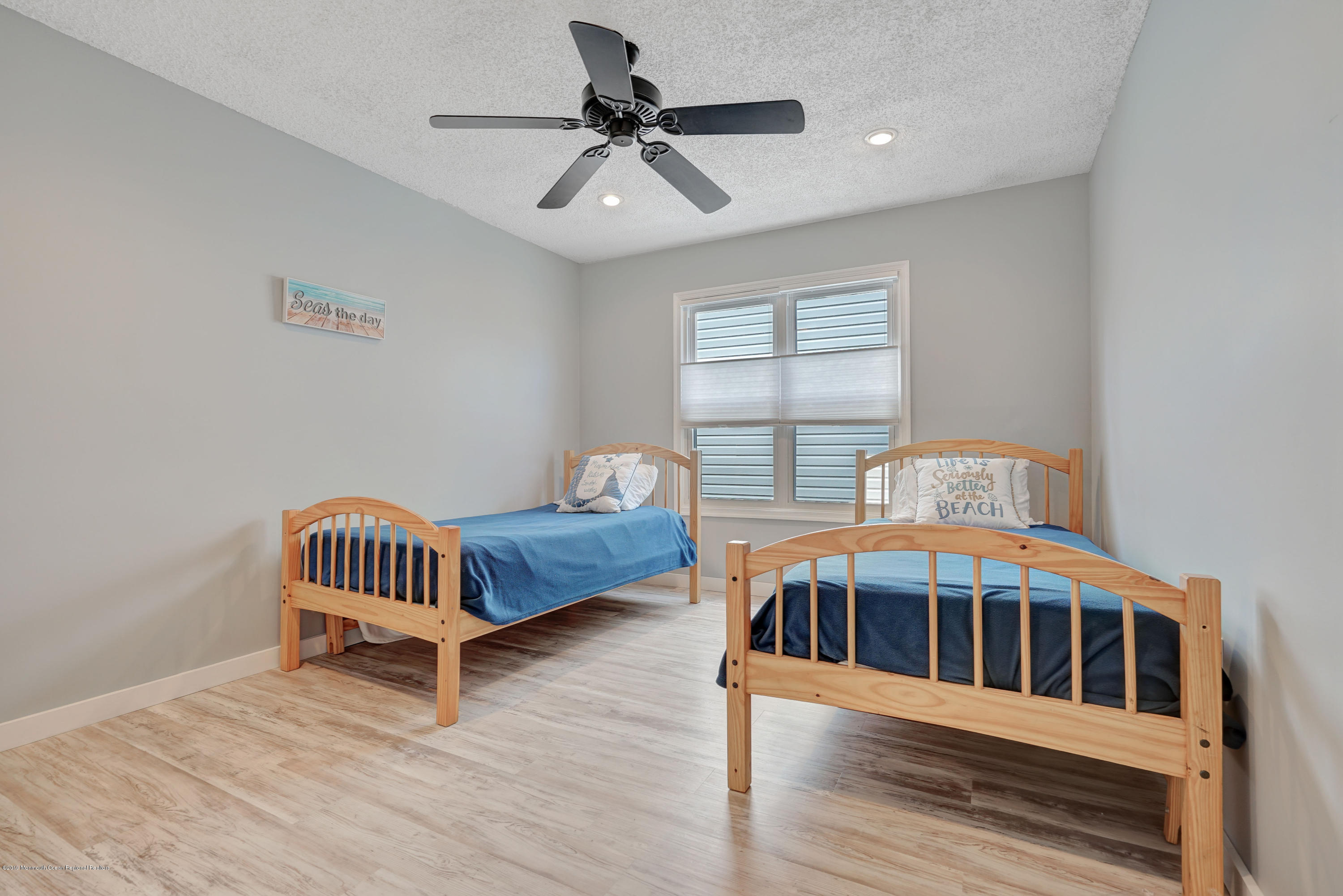 42 Hamilton Avenue, Unit B11 Seaside Heights, NJ 08751 - Photo 20 of 24 a bedroom with furniture and window