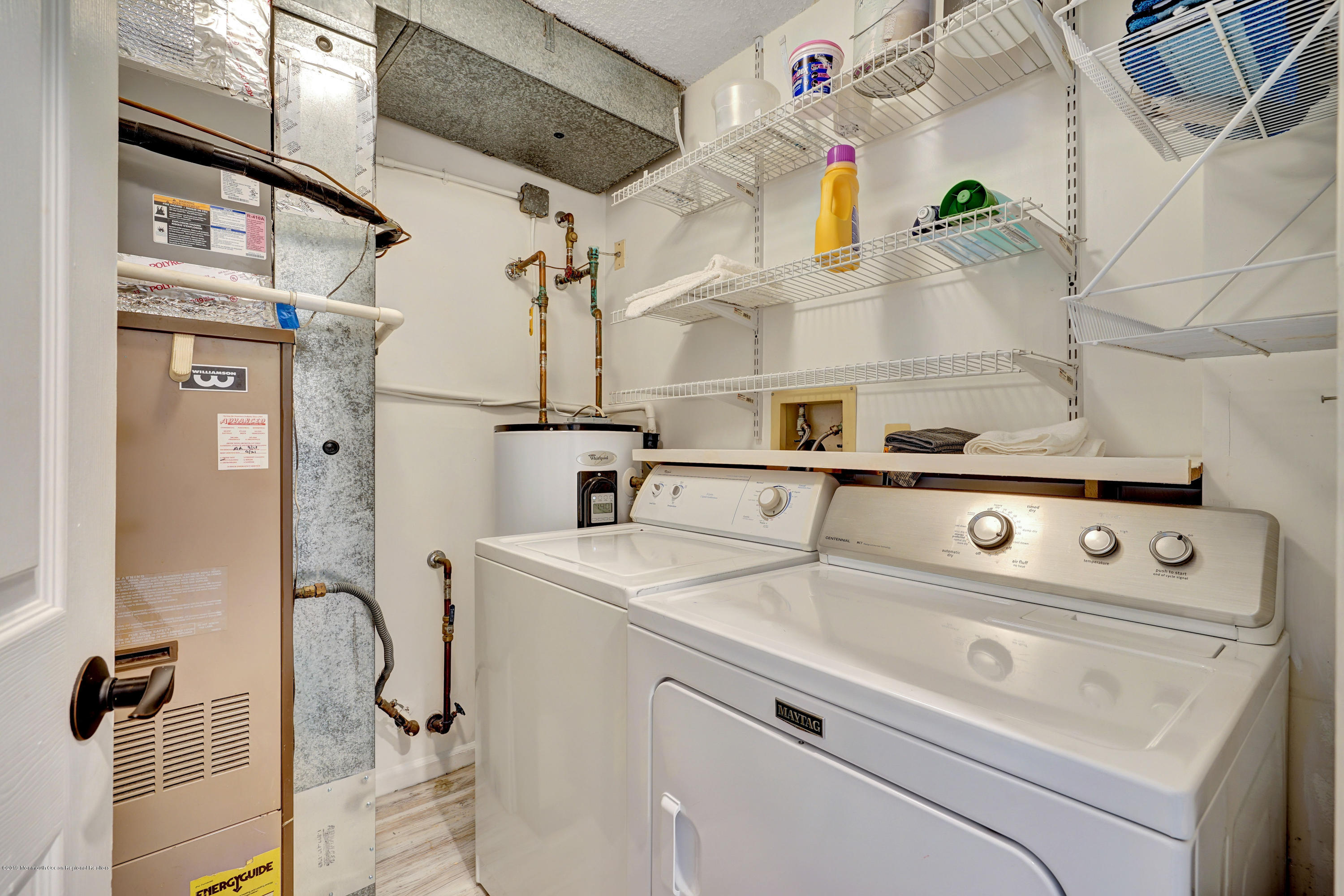 42 Hamilton Avenue, Unit B11 Seaside Heights, NJ 08751 - Photo 23 of 24 a utility room with dryer and washer
