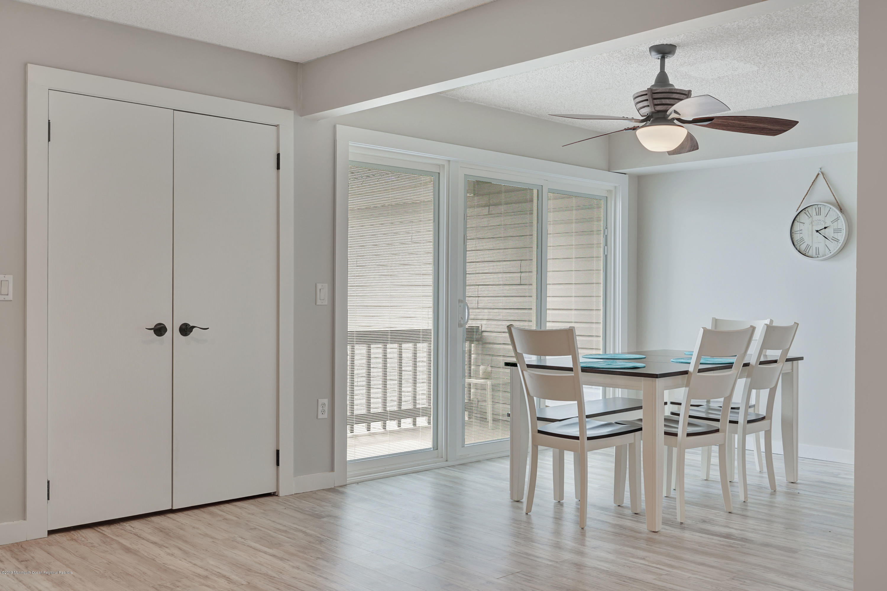 42 Hamilton Avenue, Unit B11 Seaside Heights, NJ 08751 - Photo 7 of 24 a view of a dining room with furniture window and wooden floor