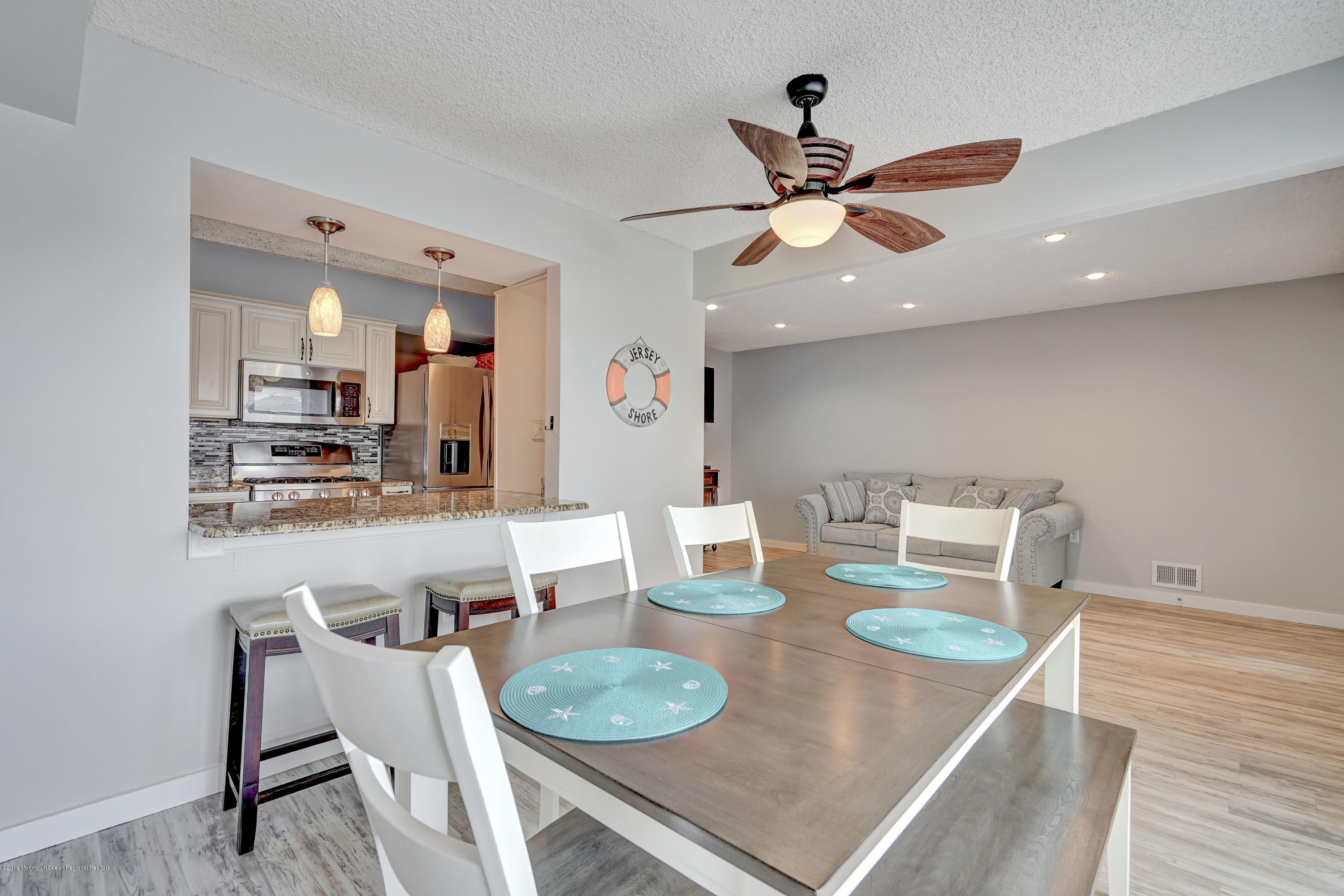 42 Hamilton Avenue, Unit B11 Seaside Heights, NJ 08751 - Photo 10 of 24 a dining room with furniture and a kitchen view