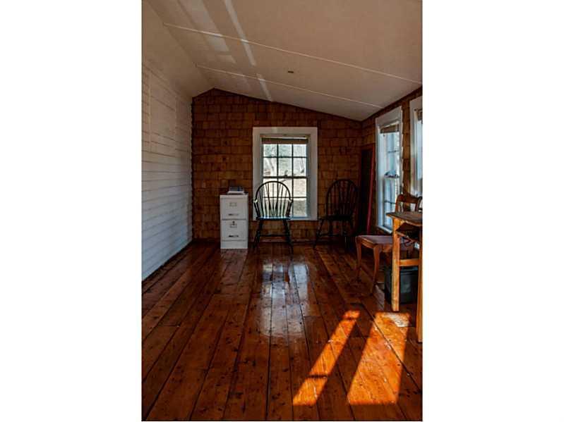36-40 Hodgdon Road Tremont, ME 04674 - Photo 11 of 35 Sunroom. Beautiful wood floors of...