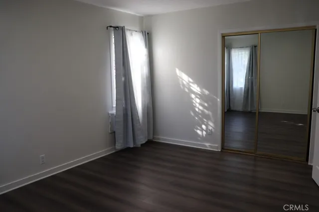 a kitchen with a sink stove and microwave