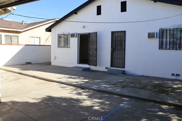 a bathroom with a sink mirror toilet and a shower