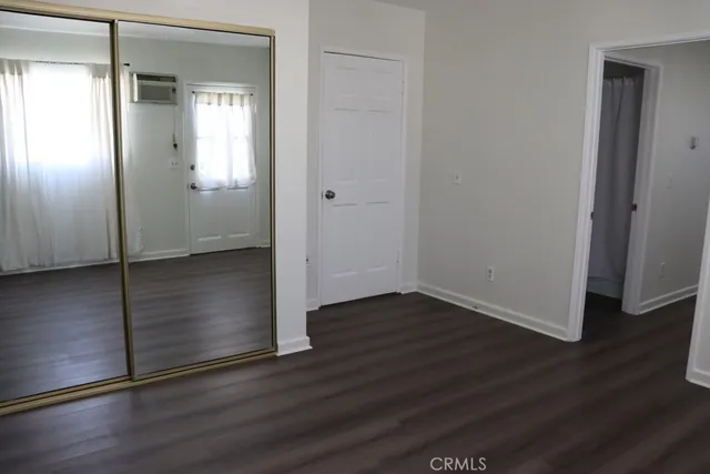 a view of small space with wooden floor