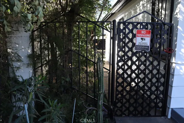 a view of hallway with wooden floor