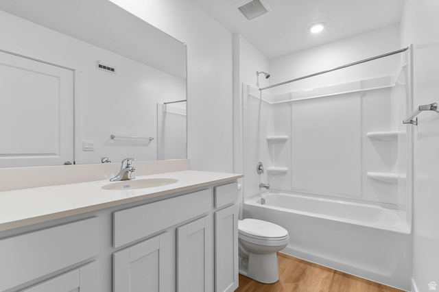 1907 East 640th North, Unit 1225 Salem, UT 84653 - Photo 5 of 20 Bathroom featuring a vanity with an integrated sink, polished chrome faucet, and a large wall-mounted mirror