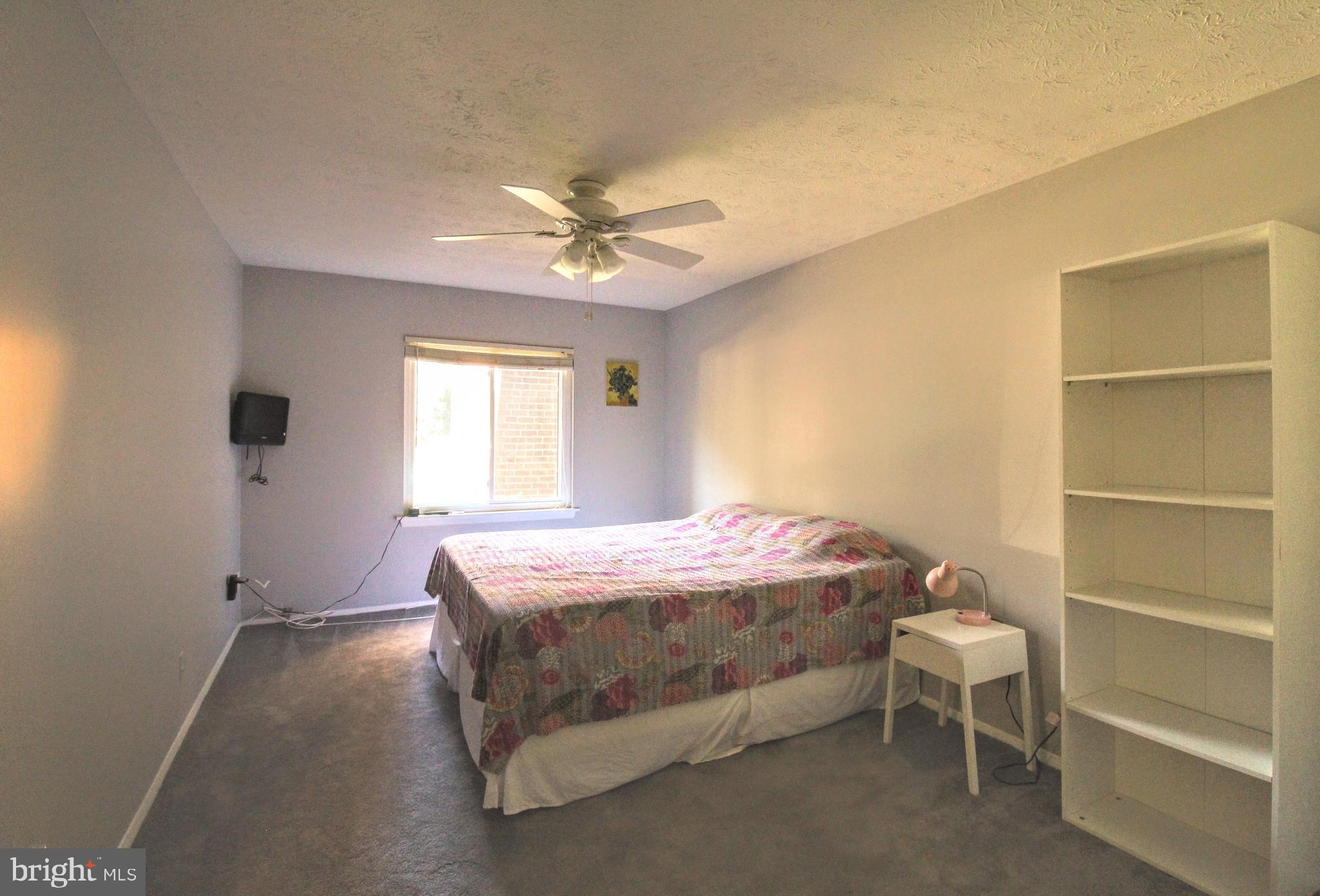 1503 Largo Road, Unit 101 Henrico, VA 23238 - Photo 22 of 35 a bedroom with a bed and a window