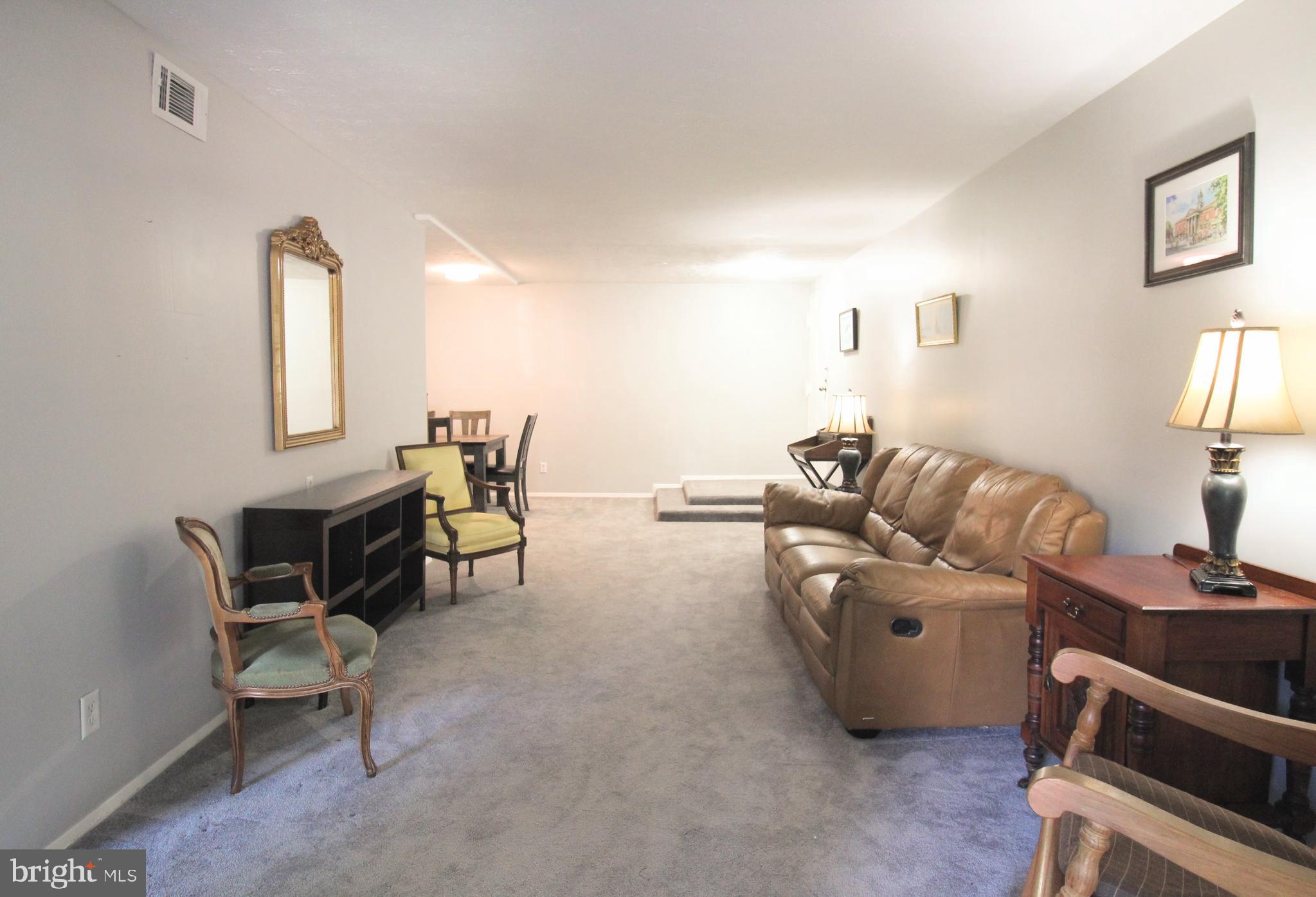 1503 Largo Road, Unit 101 Henrico, VA 23238 - Photo 6 of 35 a living room with furniture