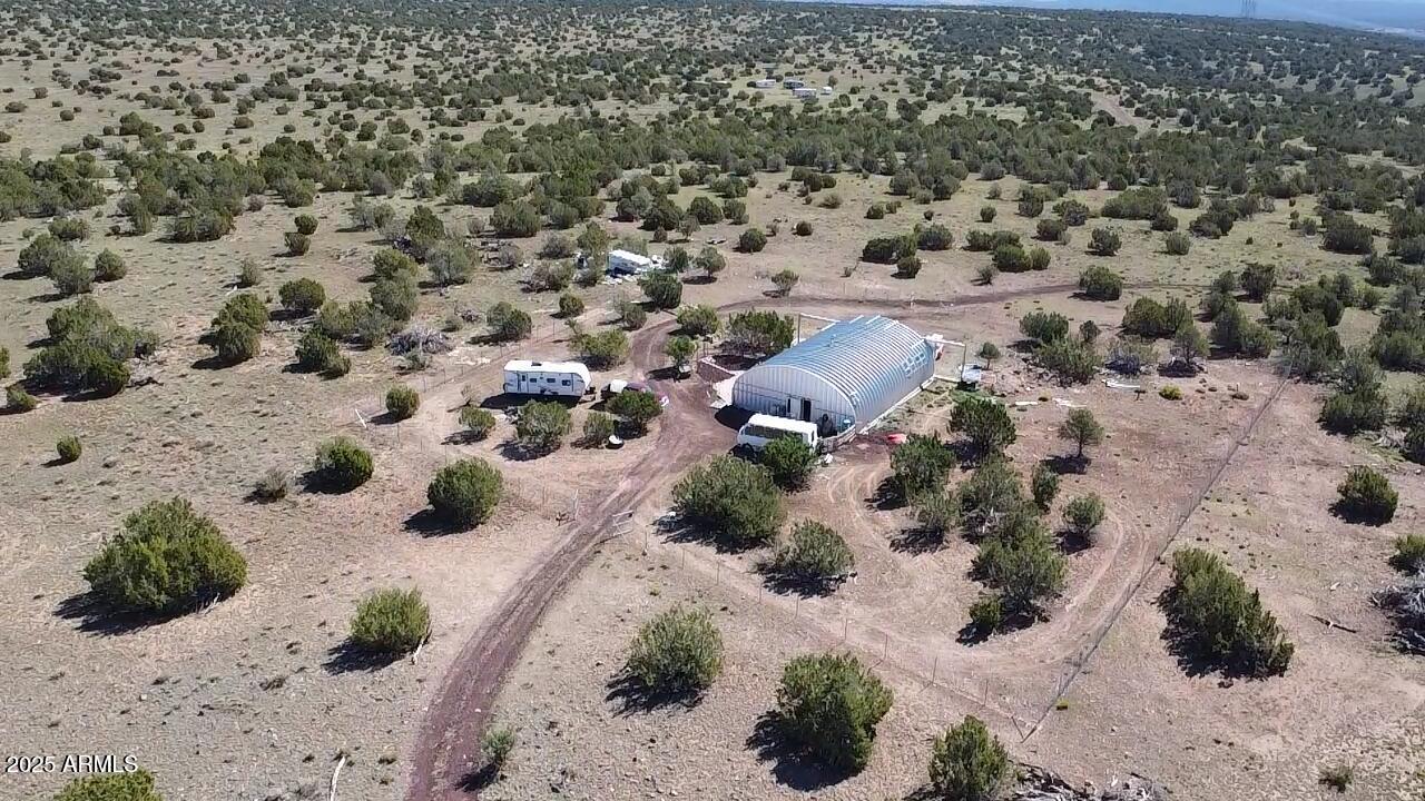 613 Mountain Cat Road Williams, AZ 86046 - Photo 3 of 14 a view of a backyard of a house