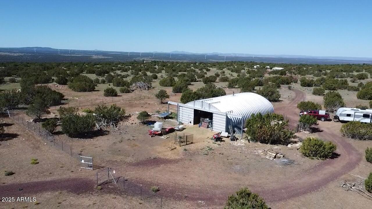 613 Mountain Cat Road Williams, AZ 86046 - Photo 4 of 14 an aerial view of a house with a garden