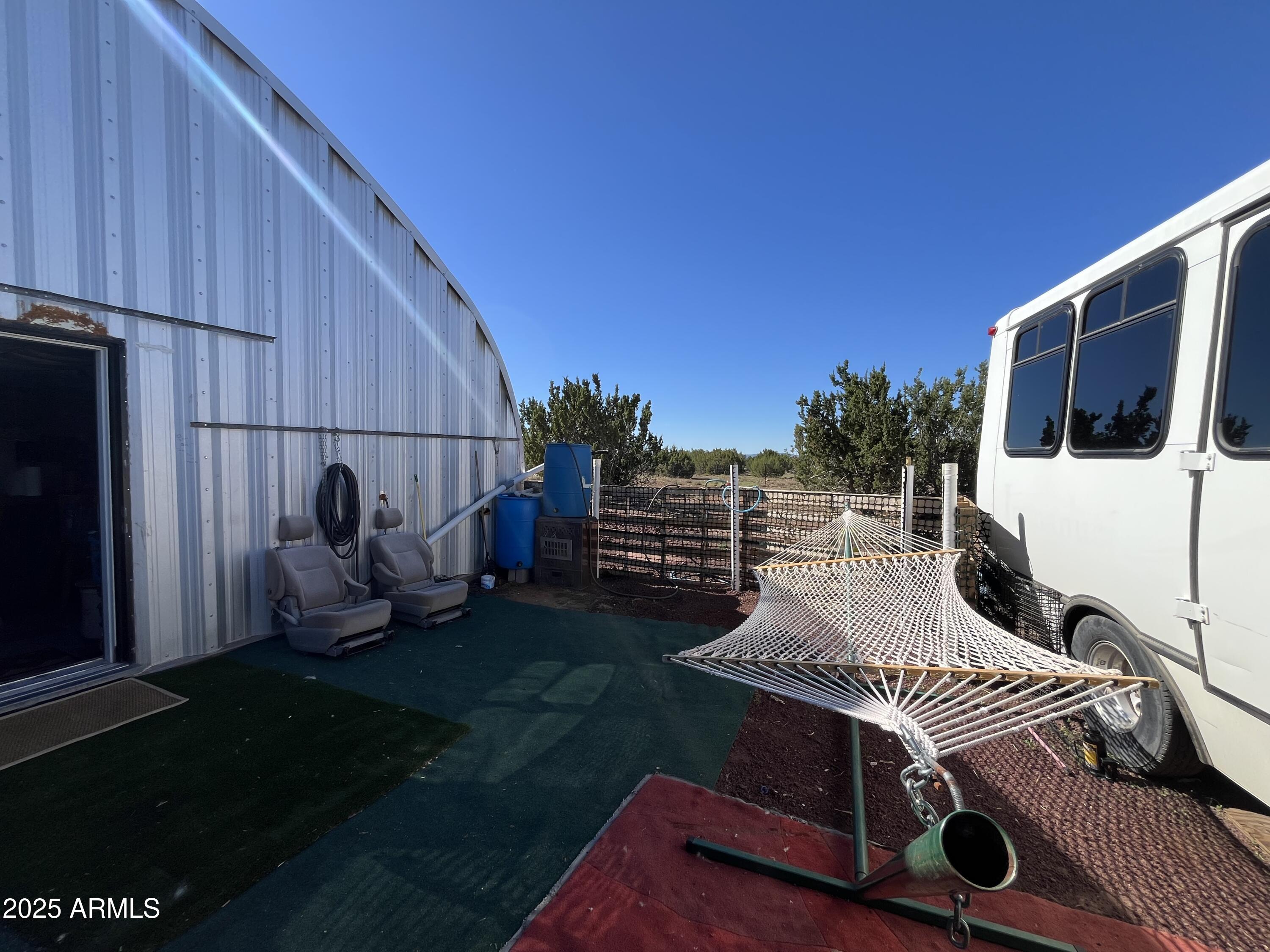 613 Mountain Cat Road Williams, AZ 86046 - Photo 10 of 14 a view of a backyard with sitting area